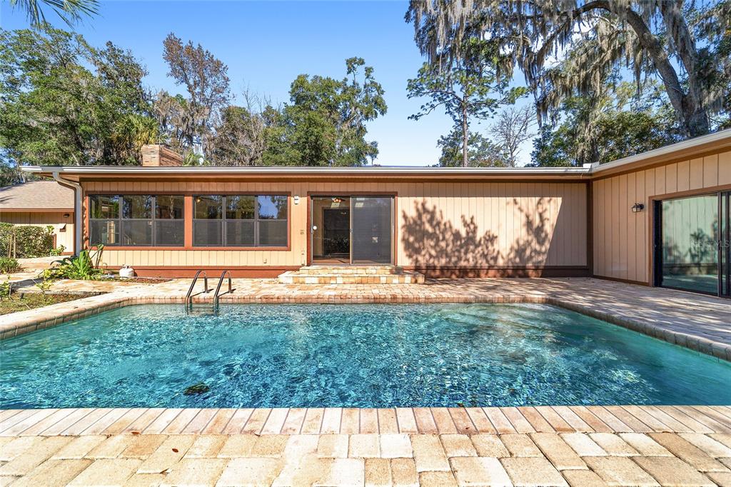 2416 Southeast 15th Street Ocala, FL 34471 - Photo 83 of 98 front view of a house with a yard