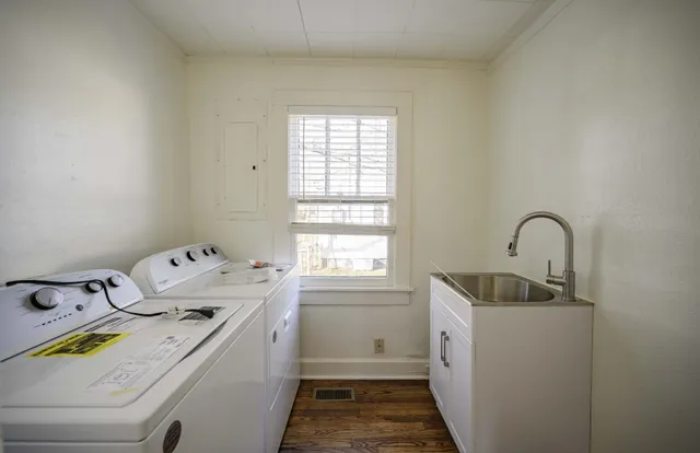 a utility room with dryer and washer
