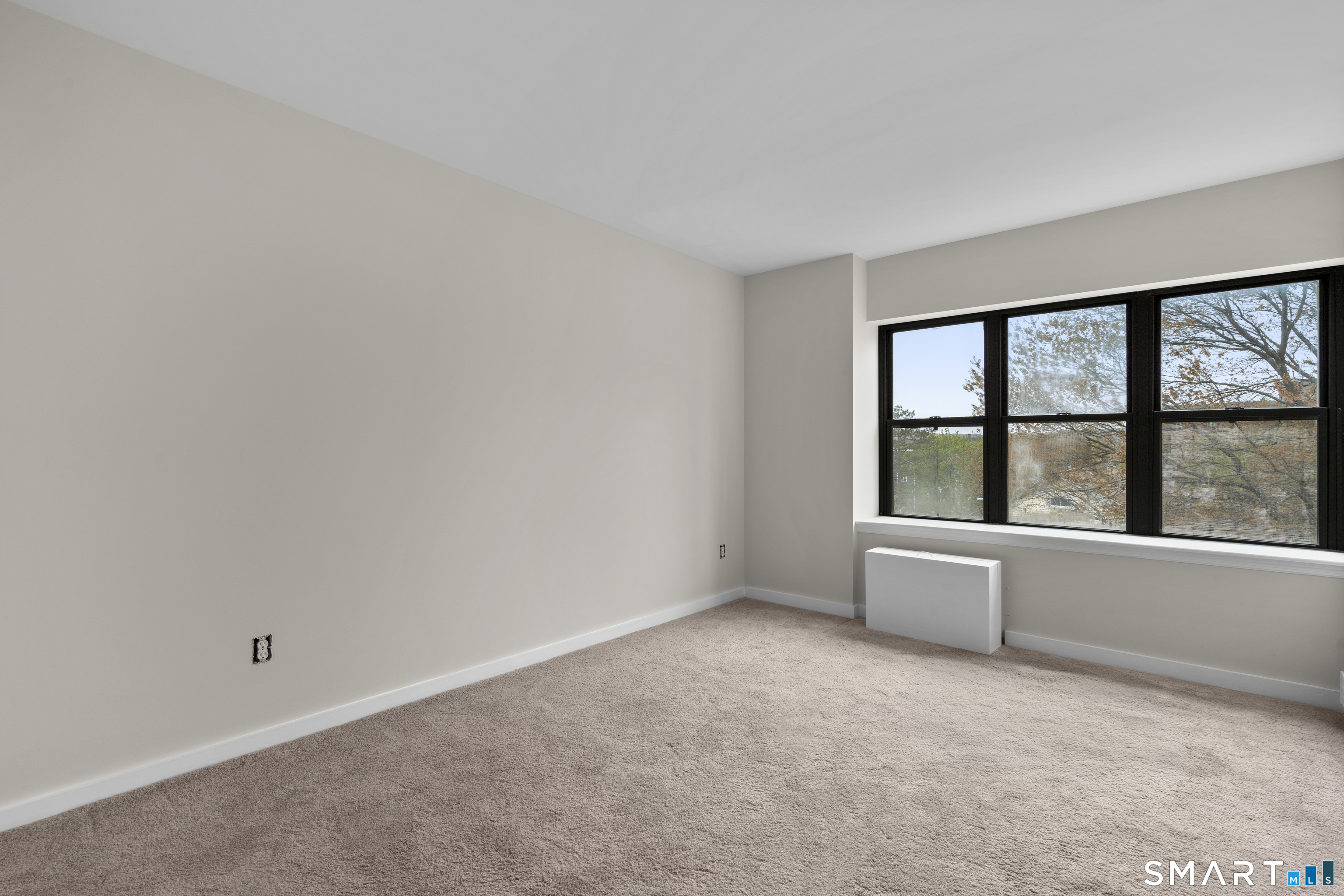 201 College Street, Unit 5 Middletown, CT 06457 - Photo 17 of 30 an empty room with large window