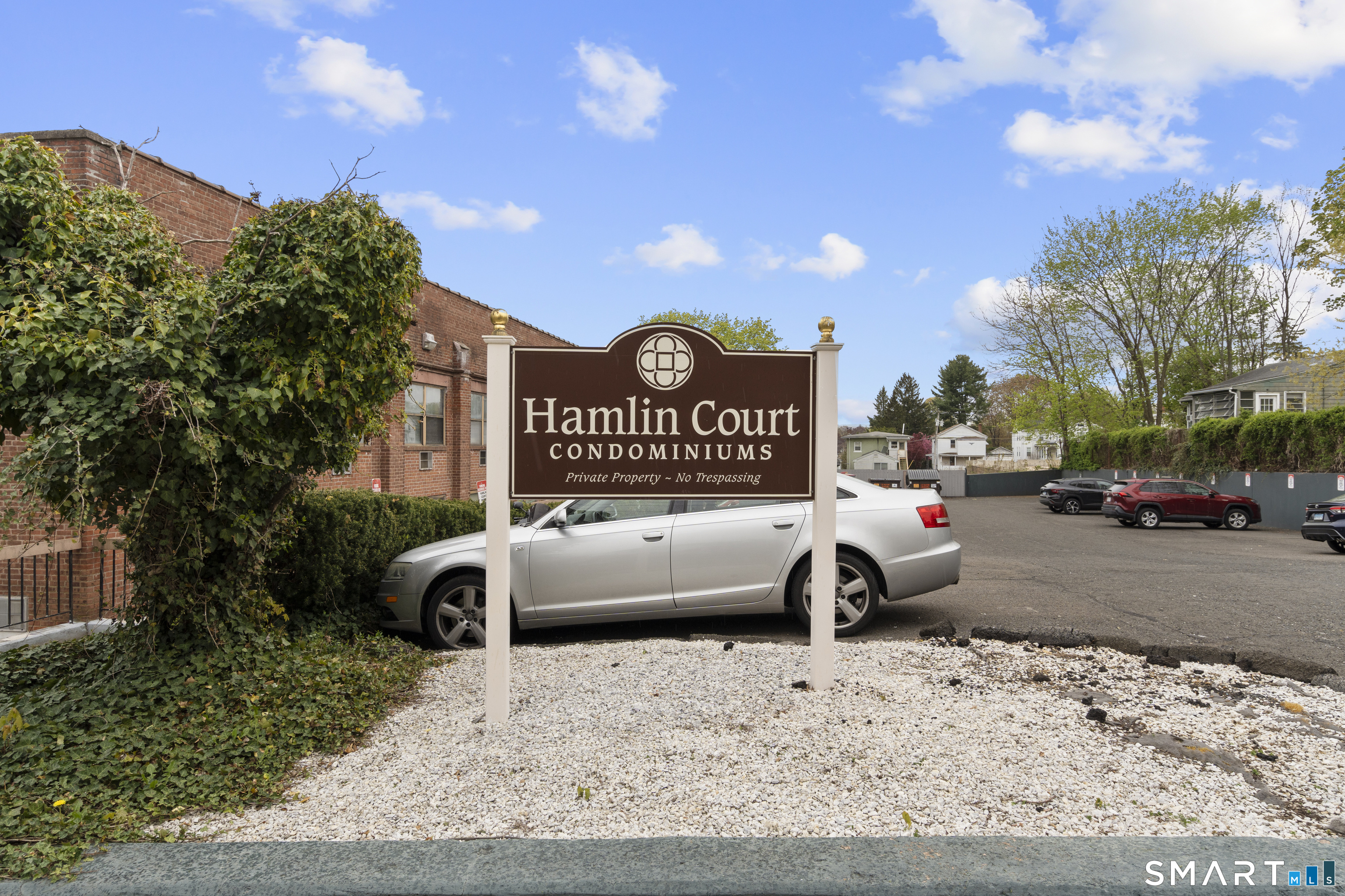201 College Street, Unit 5 Middletown, CT 06457 - Photo 2 of 30 a view of a parking space in front of a building