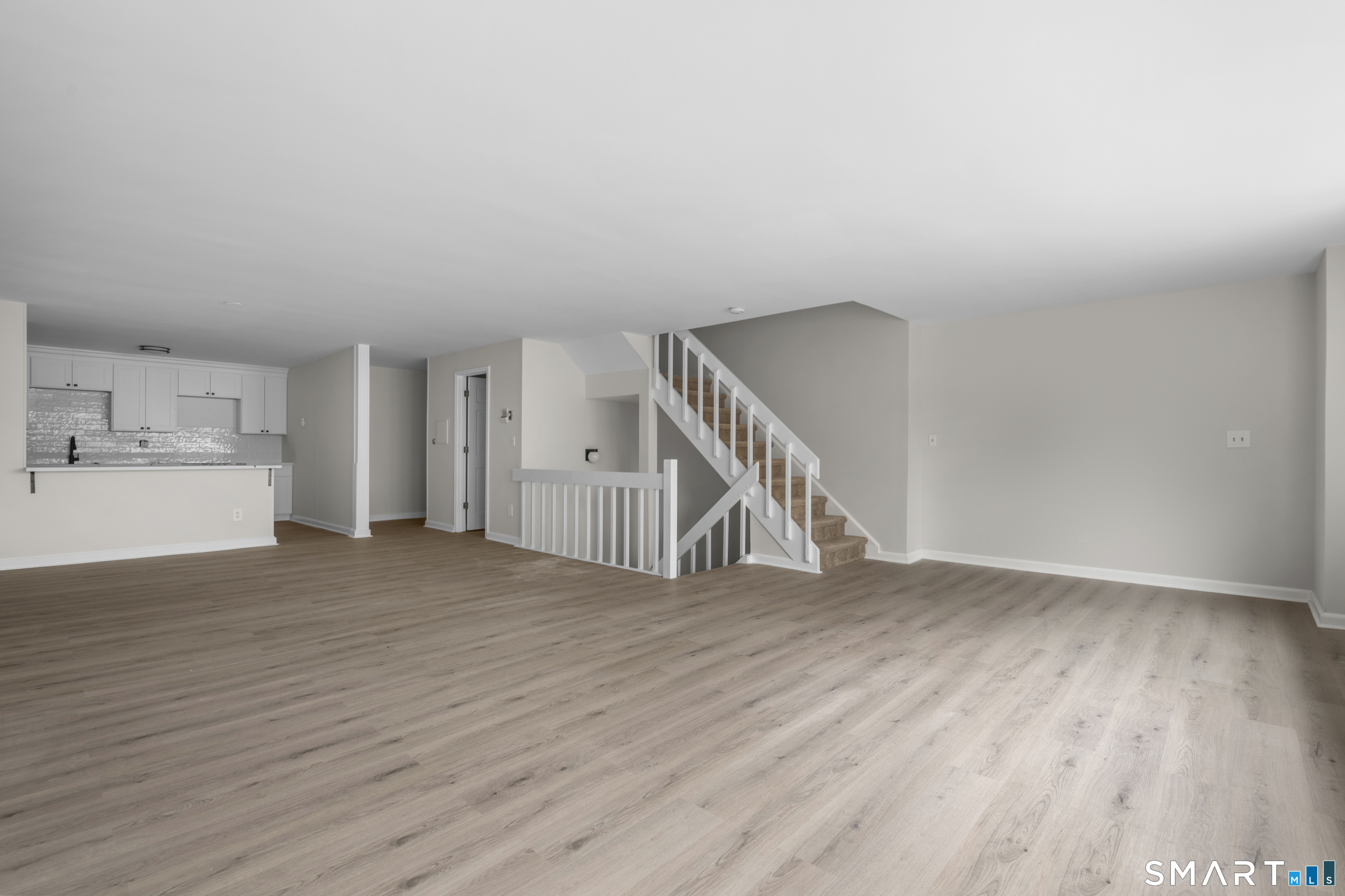 201 College Street, Unit 5 Middletown, CT 06457 - Photo 9 of 30 a view of empty room with wooden floor
