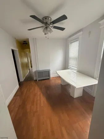 a view of a hallway with staircase