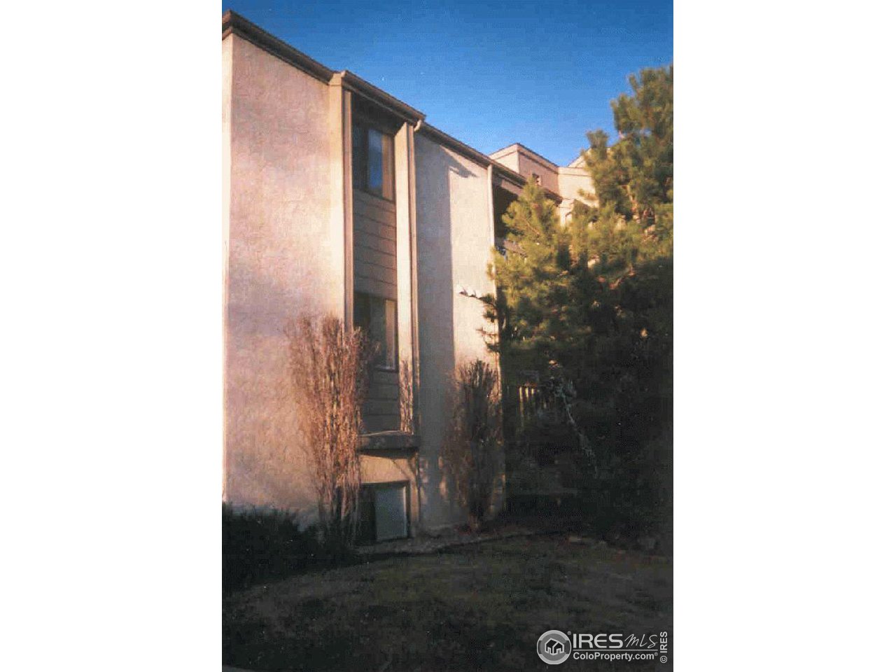 3515 28th Street, Unit 103 Boulder, CO 80301 - Photo 2 of 10 a picture of a bathroom with a shower curtain