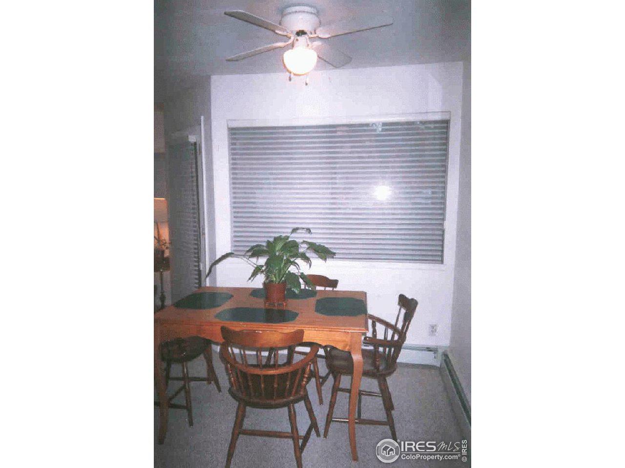 3515 28th Street, Unit 103 Boulder, CO 80301 - Photo 6 of 10 a dining room with furniture and window