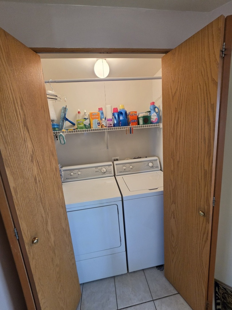 7902 Nagle Avenue, Unit 2S Burbank, IL 60459 - Photo 24 of 24 a room with storage and utility