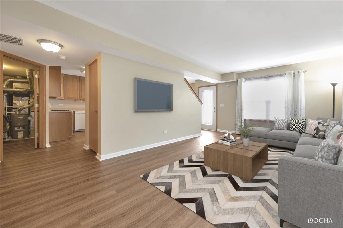3715 Harms Road Joliet, IL 60435 - Photo 3 of 28 a living room with furniture and a wooden floor