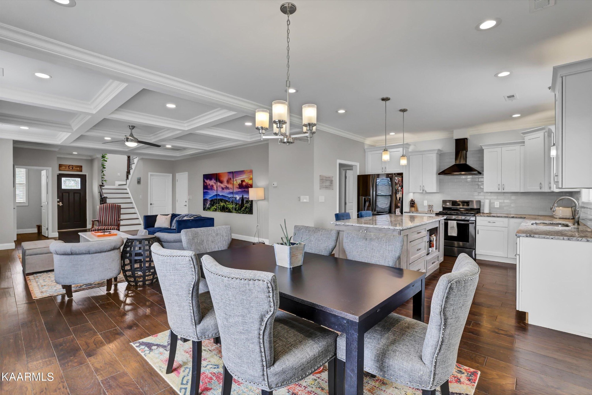 6043 Pembridge Road Knoxville, TN 37912 - Photo 11 of 49 a view of a dining room with furniture and wooden floor