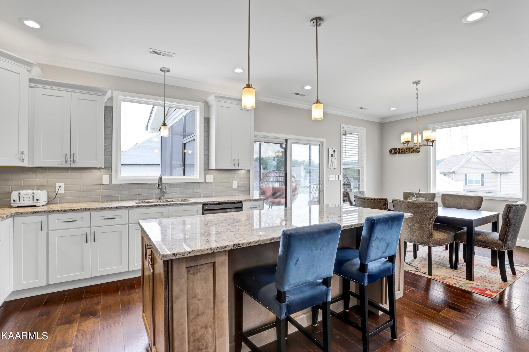 6043 Pembridge Road Knoxville, TN 37912 - Photo 14 of 49 a large kitchen with a table and chairs