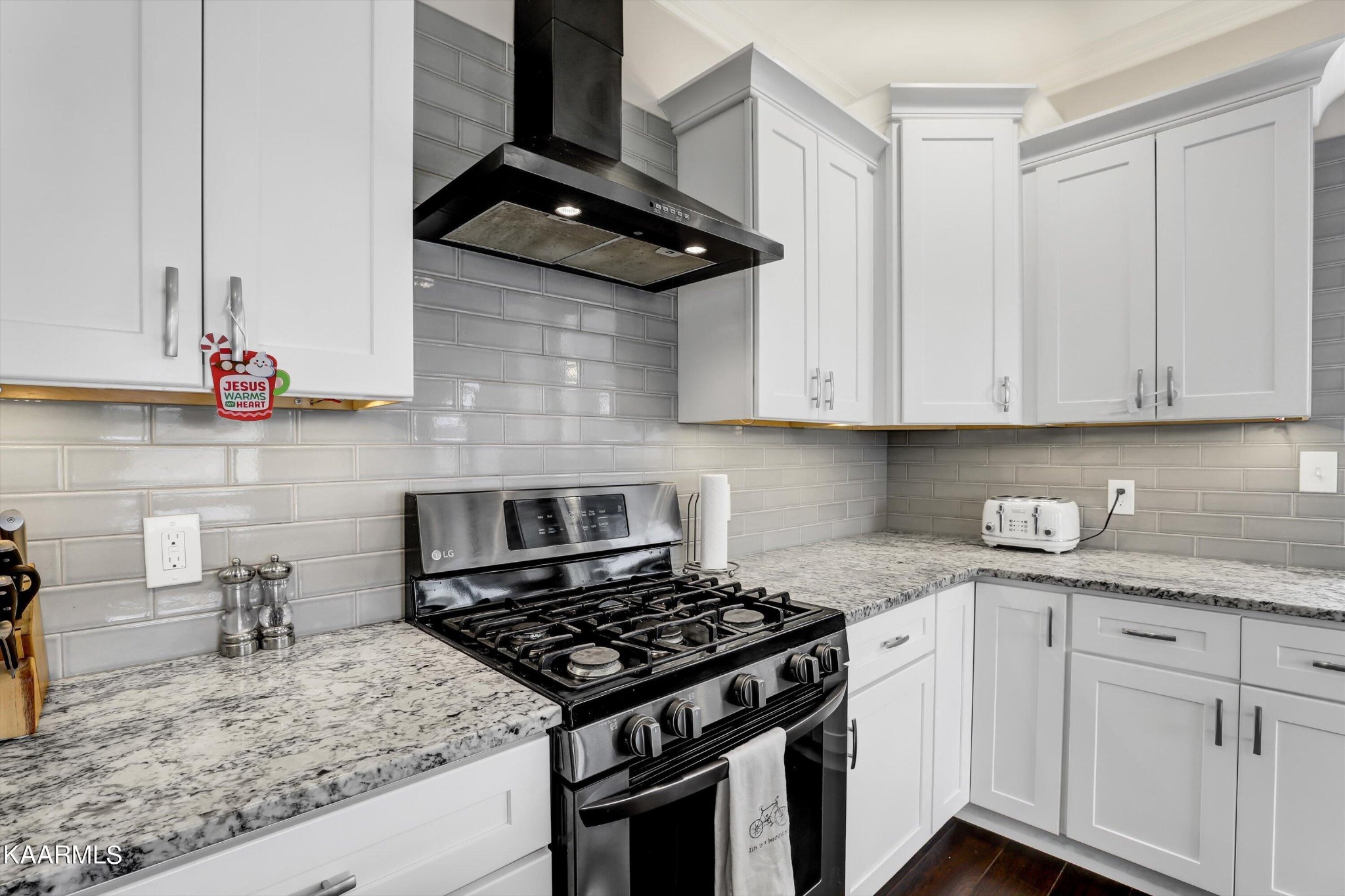 6043 Pembridge Road Knoxville, TN 37912 - Photo 16 of 49 a kitchen with stainless steel appliances granite countertop white cabinets and a stove