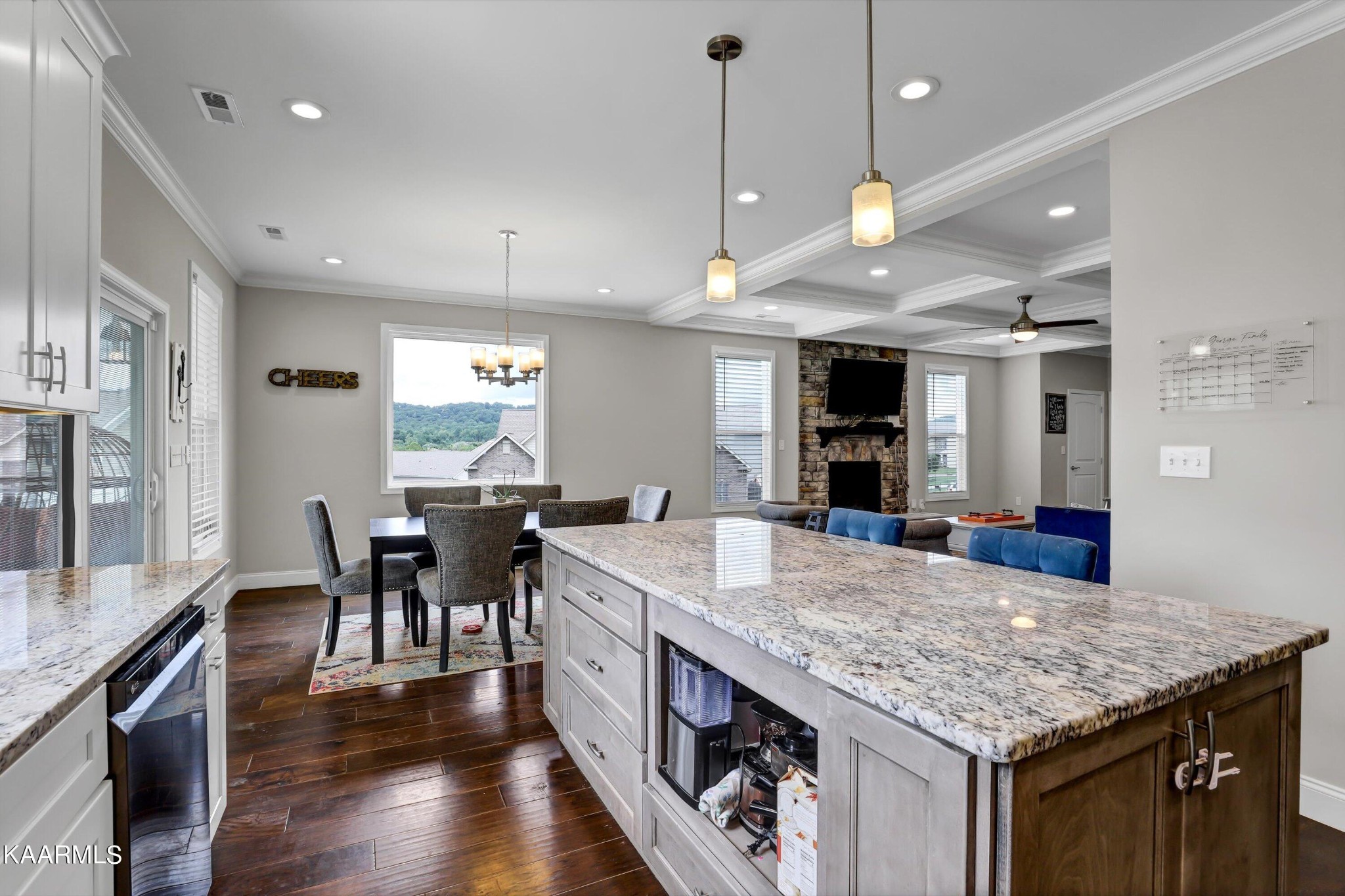 6043 Pembridge Road Knoxville, TN 37912 - Photo 17 of 49 a kitchen with center island table and chairs