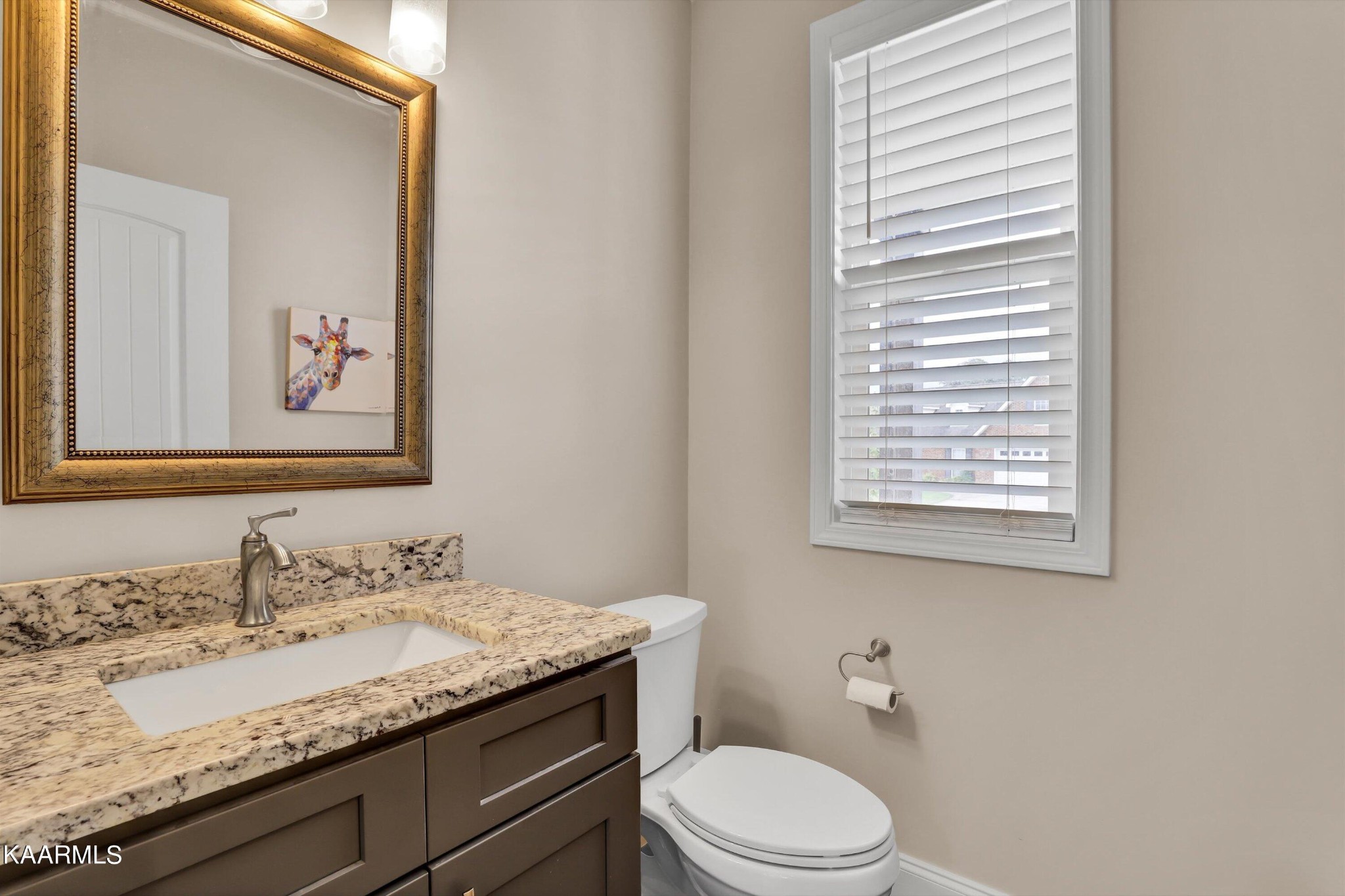6043 Pembridge Road Knoxville, TN 37912 - Photo 18 of 49 a bathroom with a granite countertop sink and a toilet