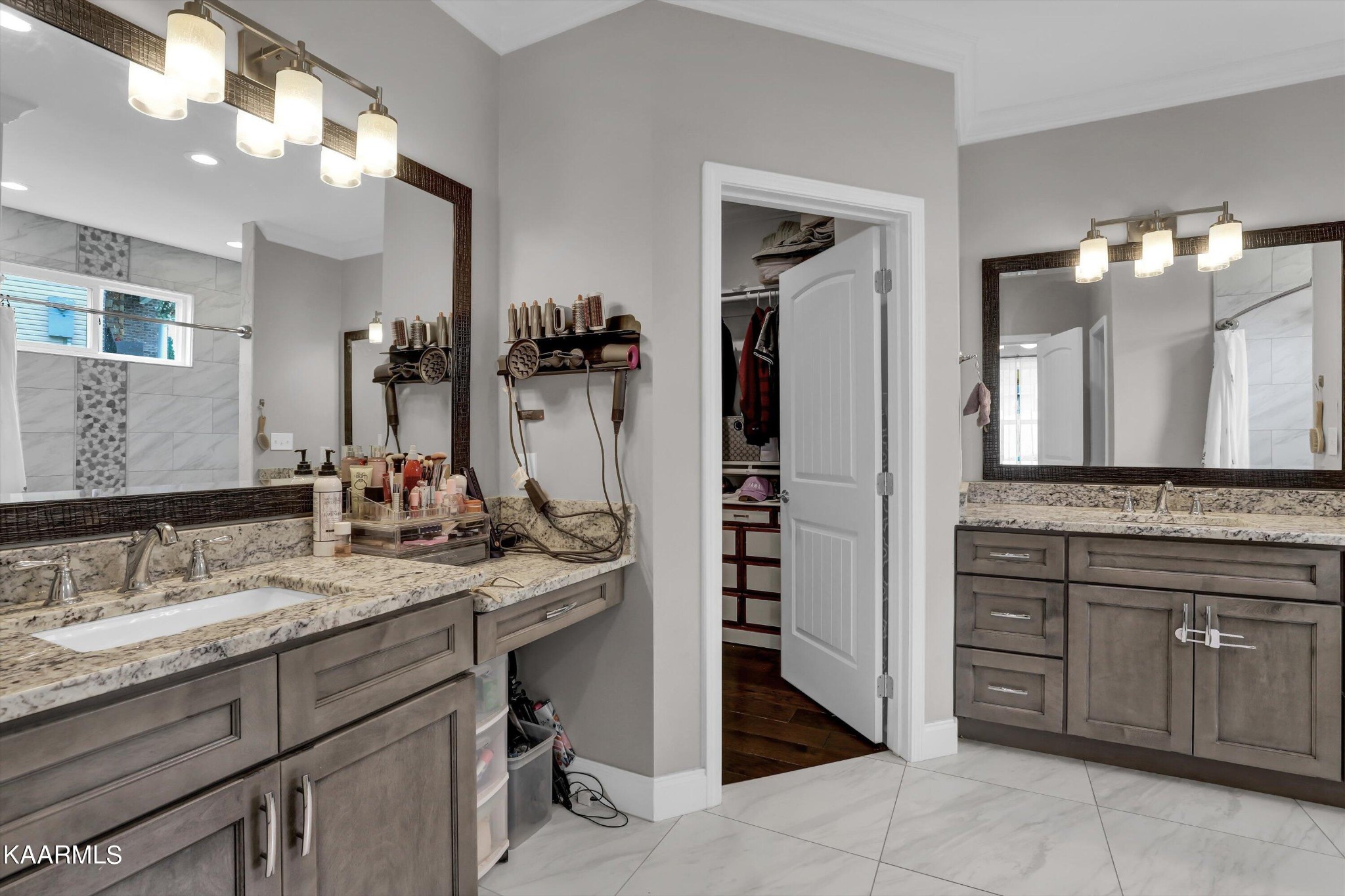 6043 Pembridge Road Knoxville, TN 37912 - Photo 21 of 49 a bathroom with a granite countertop sink and a mirror