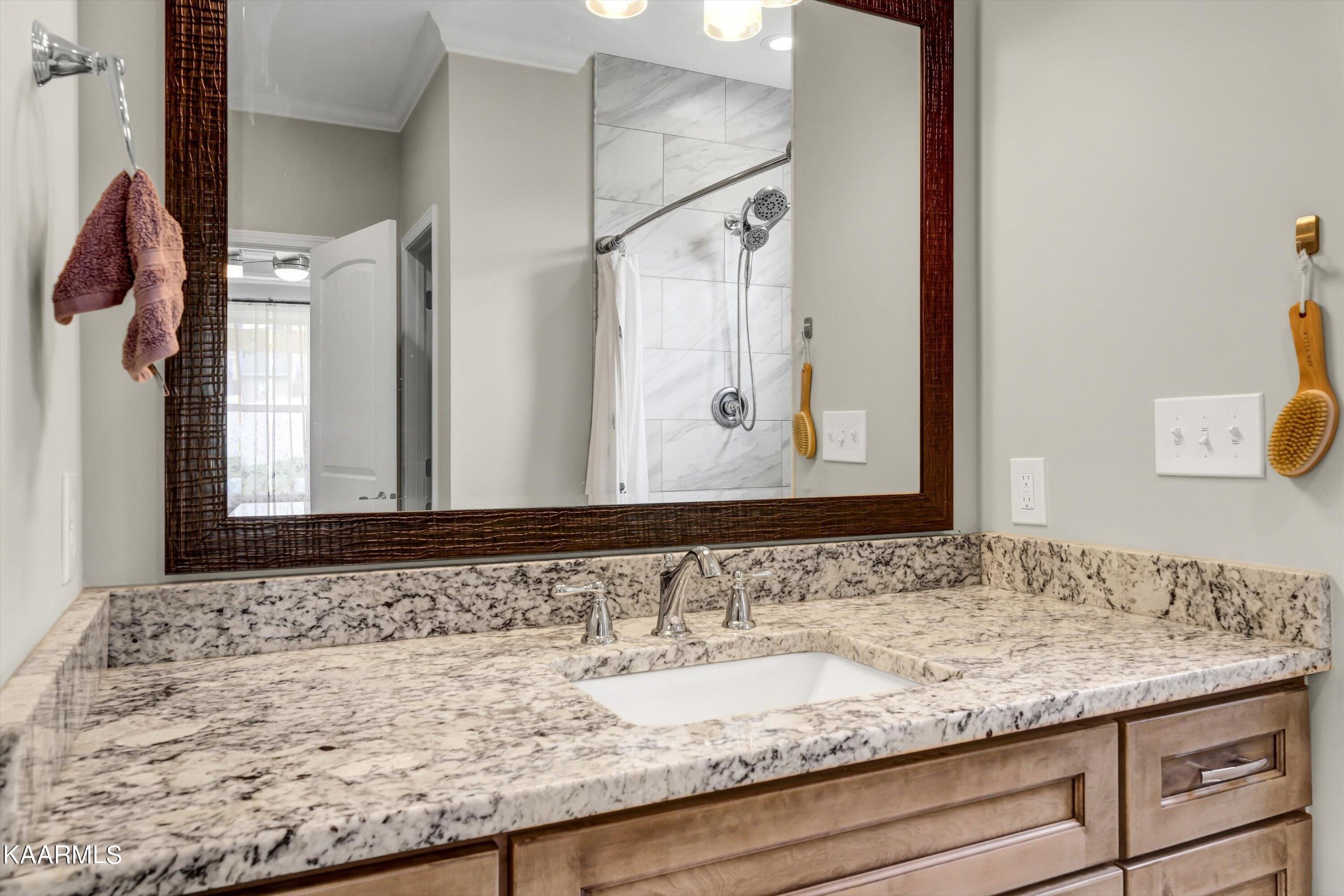 6043 Pembridge Road Knoxville, TN 37912 - Photo 24 of 49 a bathroom with a granite countertop sink and a mirror