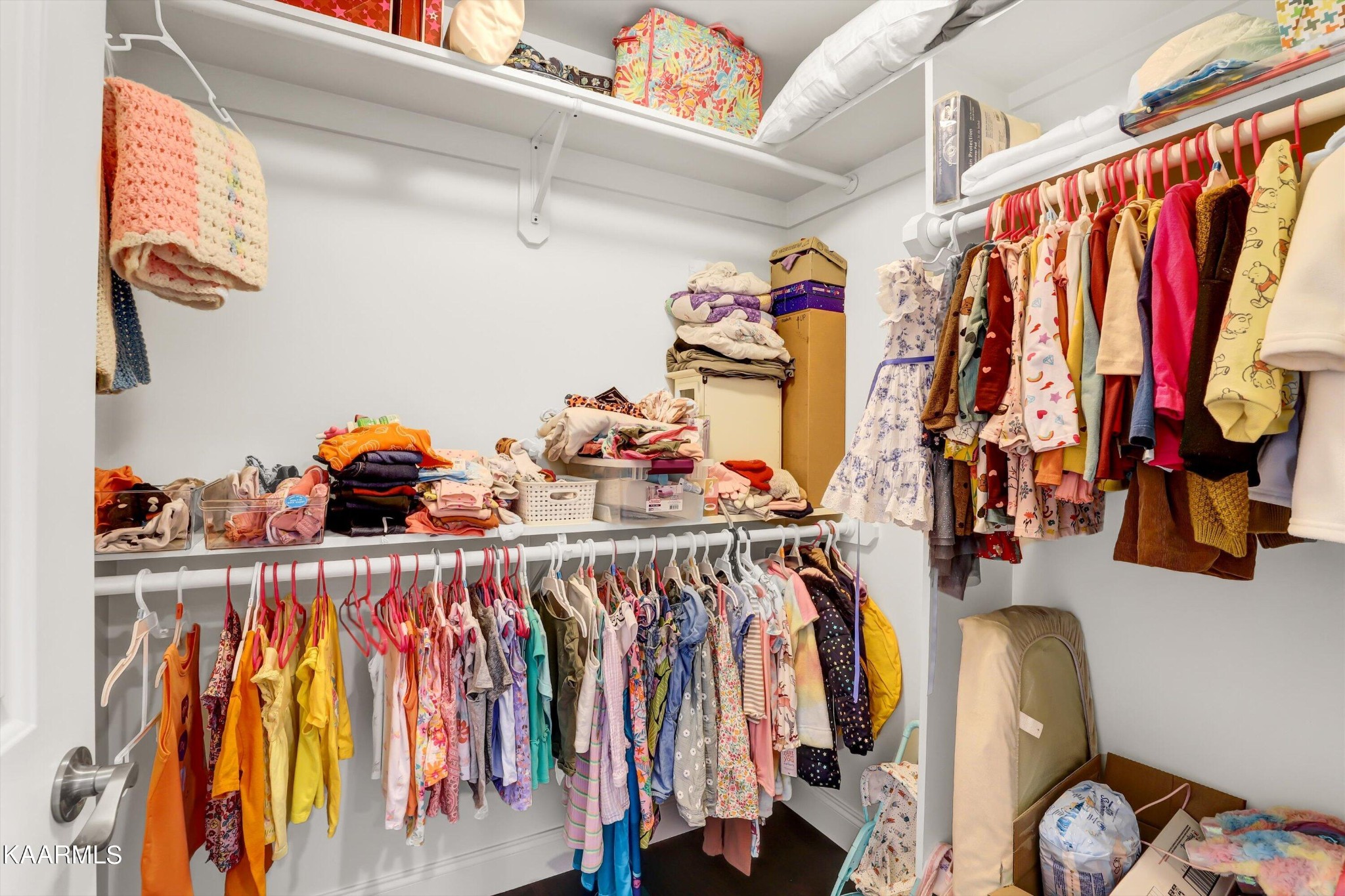 6043 Pembridge Road Knoxville, TN 37912 - Photo 30 of 49 a view of walk in closet with clothes and shoes