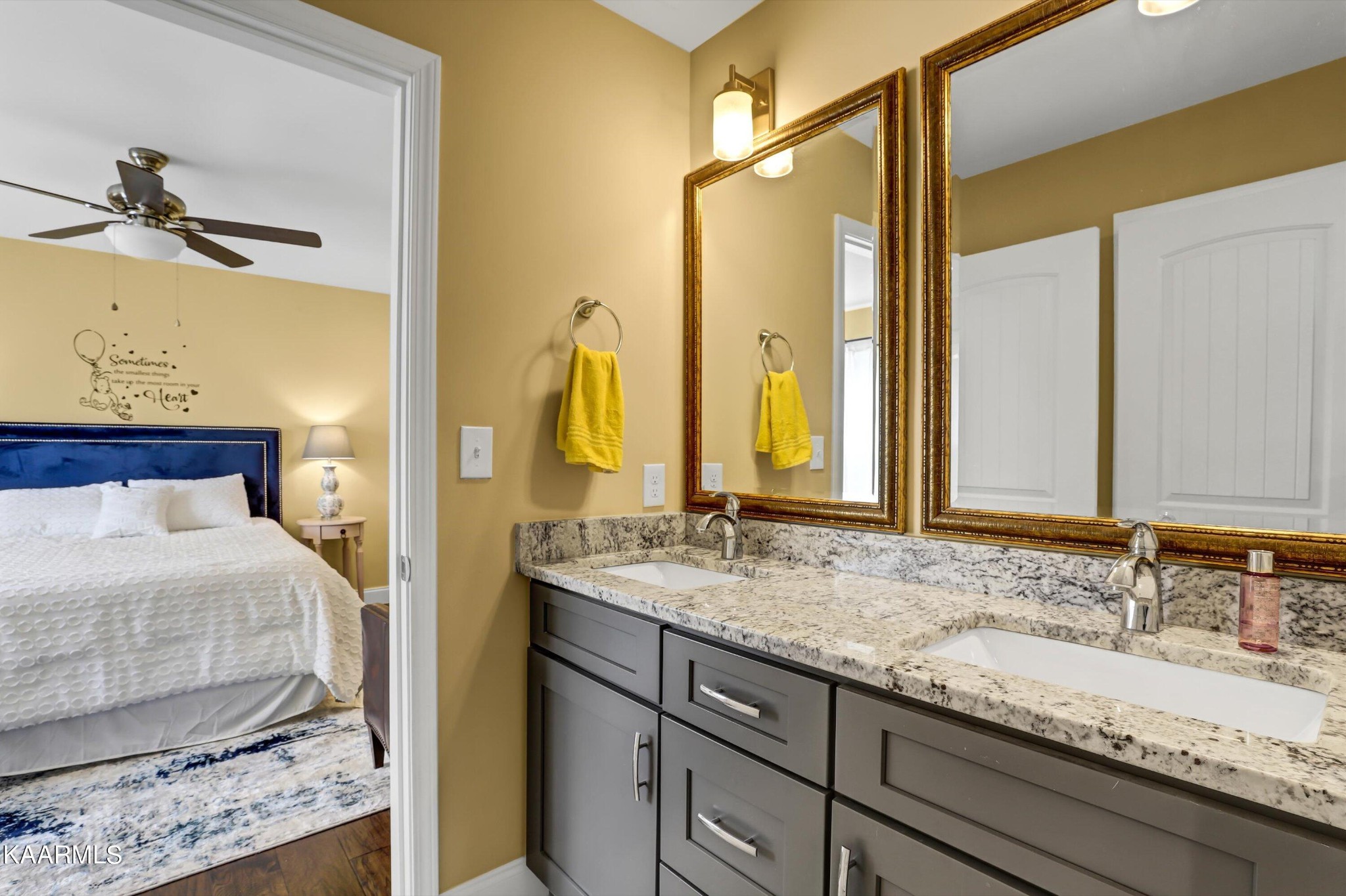 6043 Pembridge Road Knoxville, TN 37912 - Photo 35 of 49 a bathroom with a granite countertop sink and a mirror