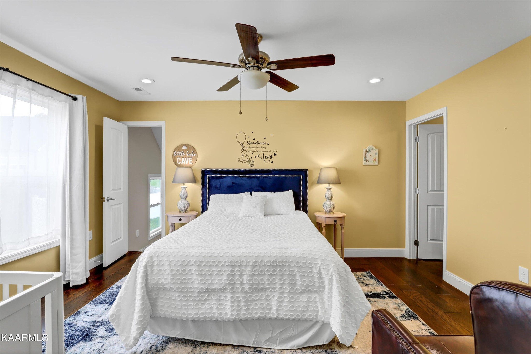 6043 Pembridge Road Knoxville, TN 37912 - Photo 37 of 49 a bedroom with a bed and wooden floor