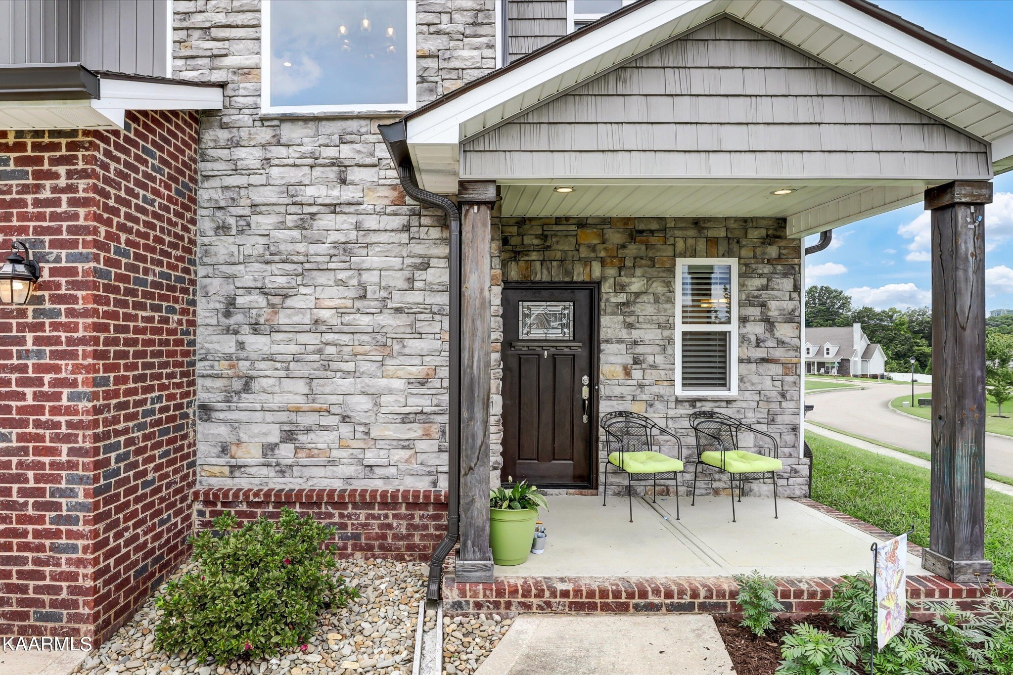 6043 Pembridge Road Knoxville, TN 37912 - Photo 4 of 49 a view of a chair and table in backyard of the house