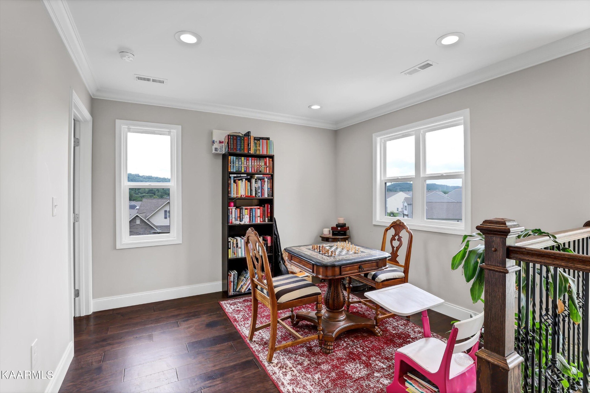 6043 Pembridge Road Knoxville, TN 37912 - Photo 44 of 49 a view of a dining room with furniture and wooden floor