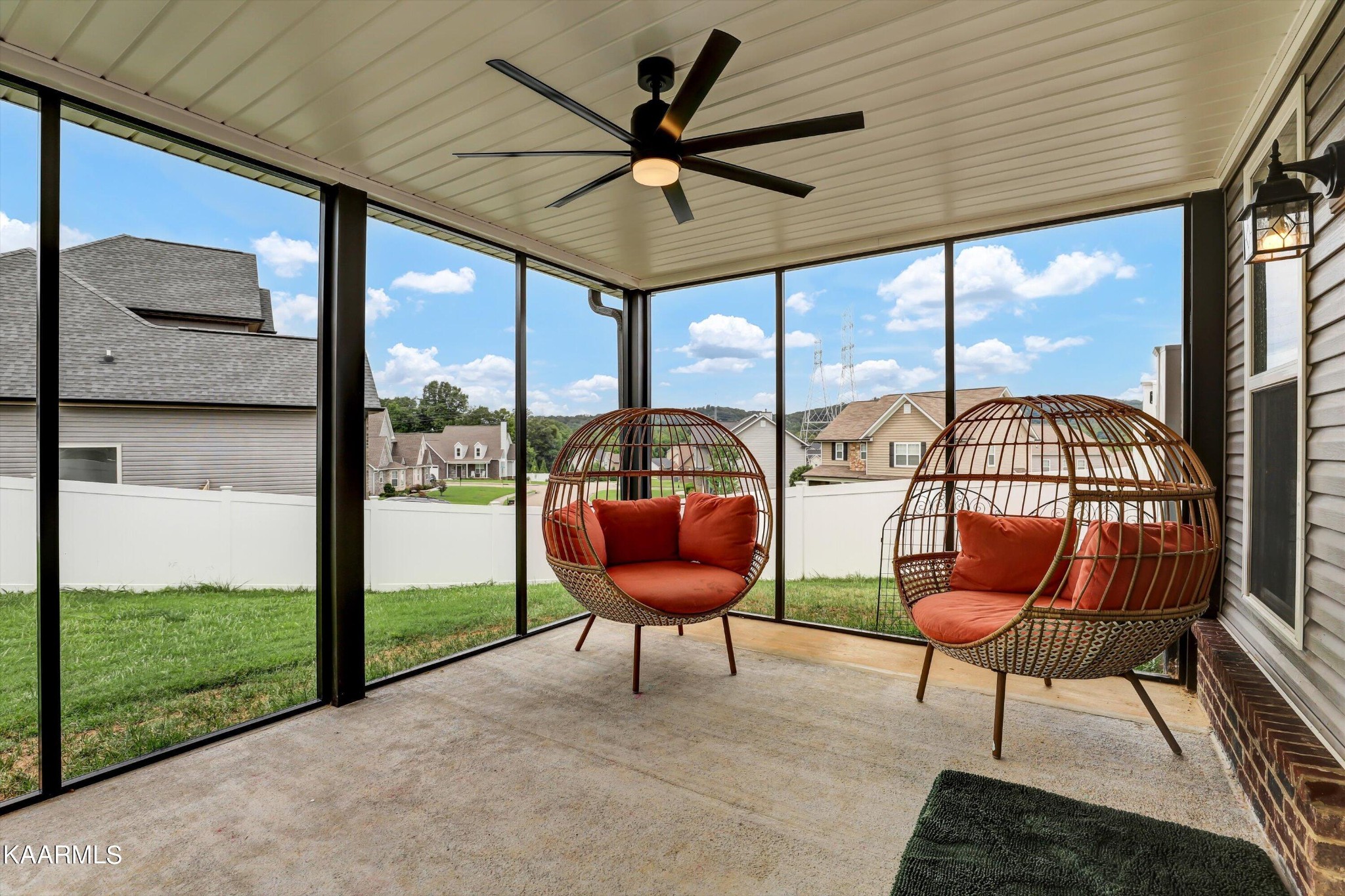 6043 Pembridge Road Knoxville, TN 37912 - Photo 45 of 49 a living room with furniture and a floor to ceiling window