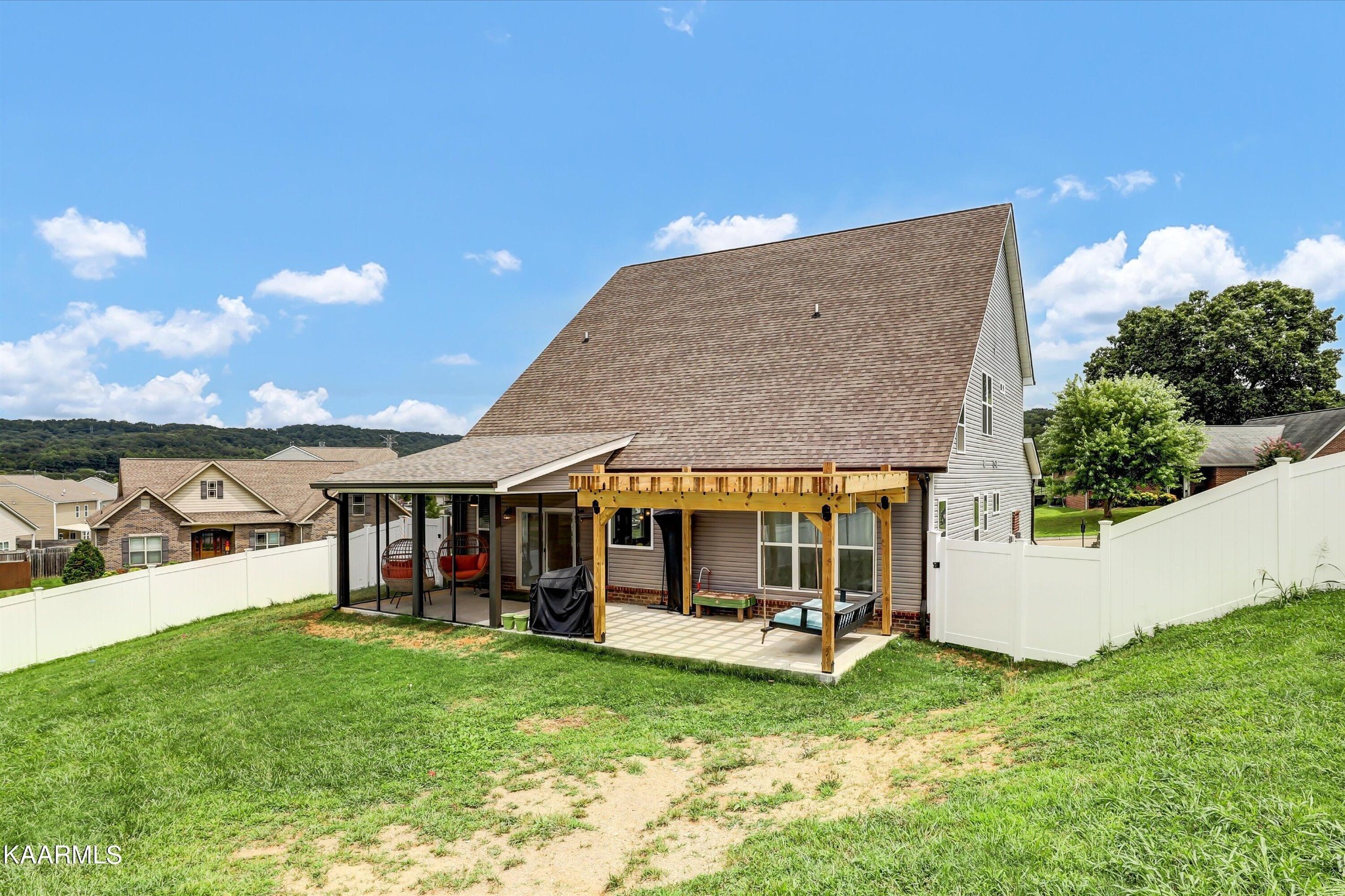 6043 Pembridge Road Knoxville, TN 37912 - Photo 49 of 49 a view of a house with backyard porch and sitting area