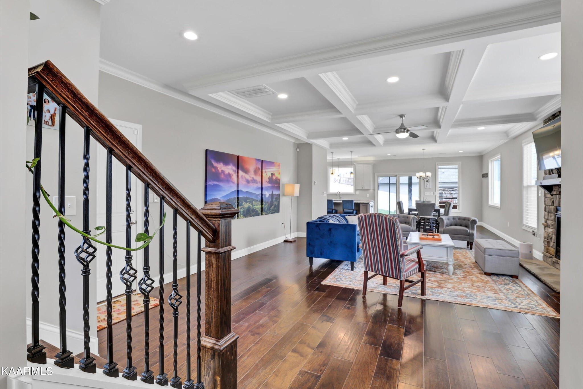 6043 Pembridge Road Knoxville, TN 37912 - Photo 5 of 49 a view of a livingroom with furniture entryway and wooden floor