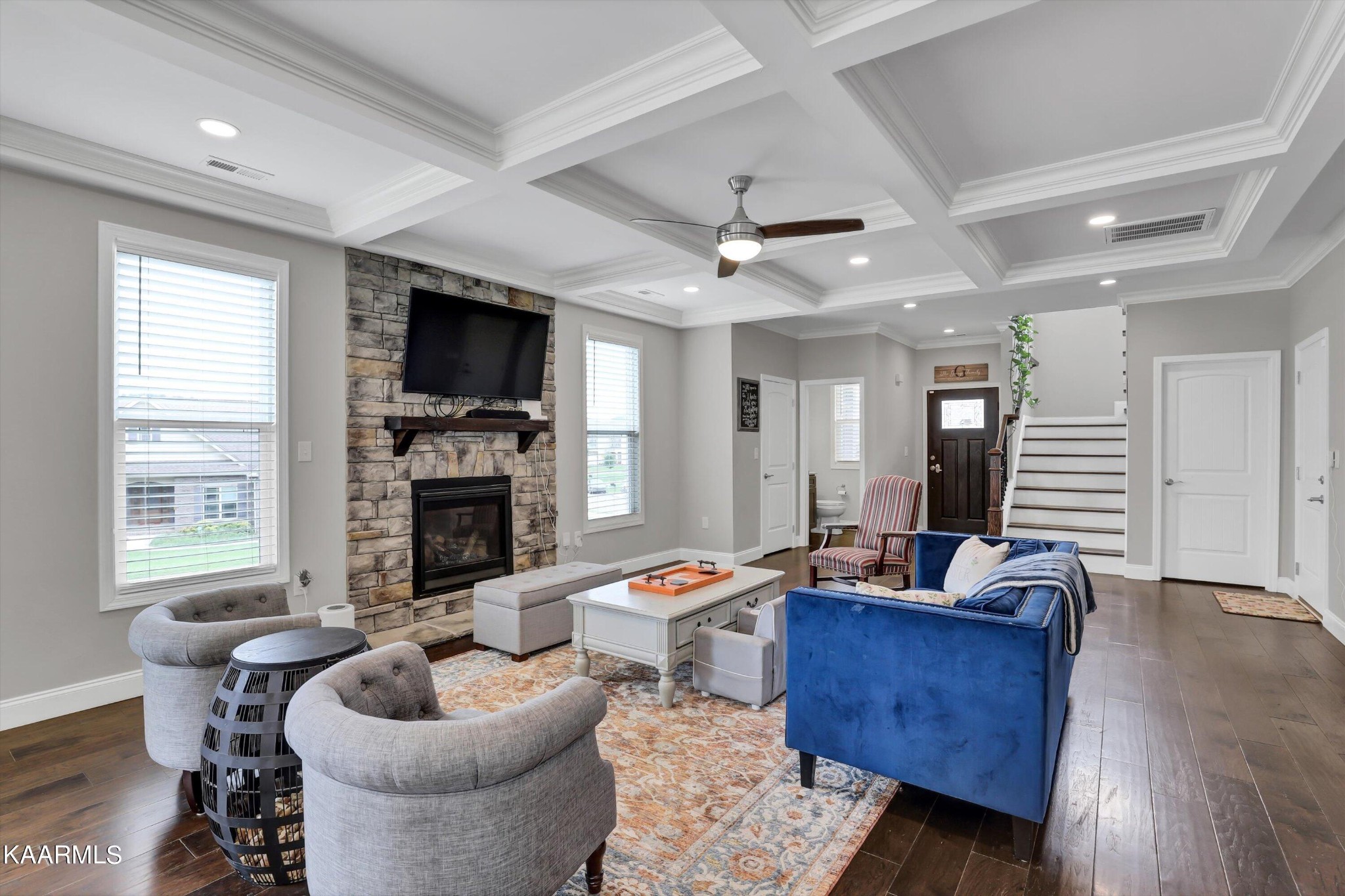 6043 Pembridge Road Knoxville, TN 37912 - Photo 7 of 49 a living room with furniture fireplace and flat screen tv
