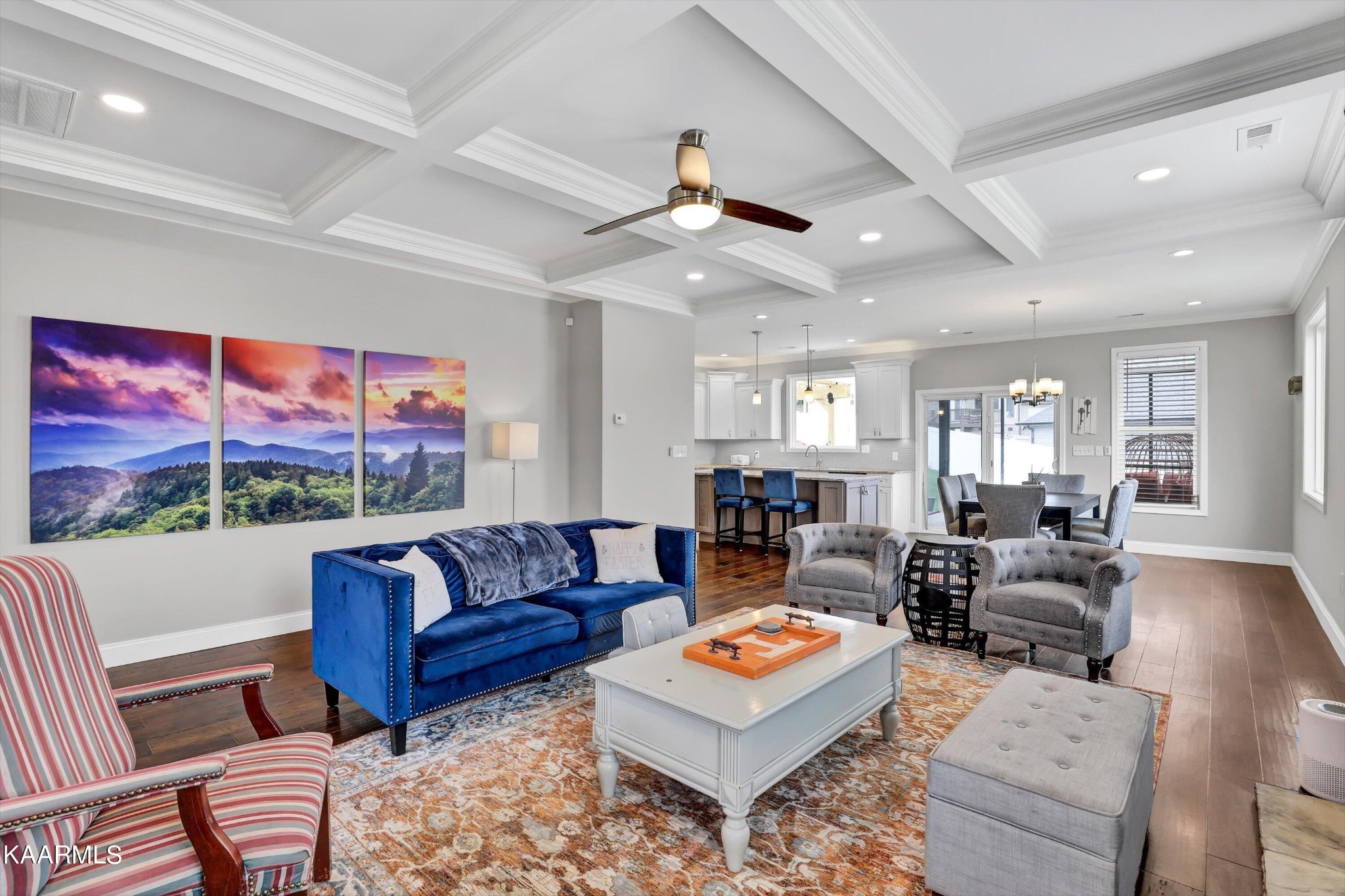 6043 Pembridge Road Knoxville, TN 37912 - Photo 8 of 49 a living room with furniture a chandelier and a flat screen tv