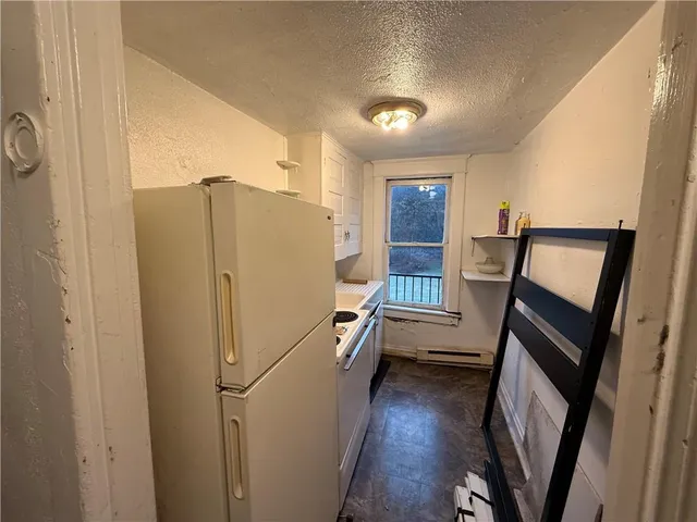 a view of a kitchen from door