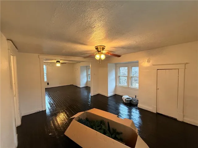 a view of a livingroom with furniture and window