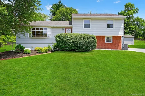 a view of a house with a garden