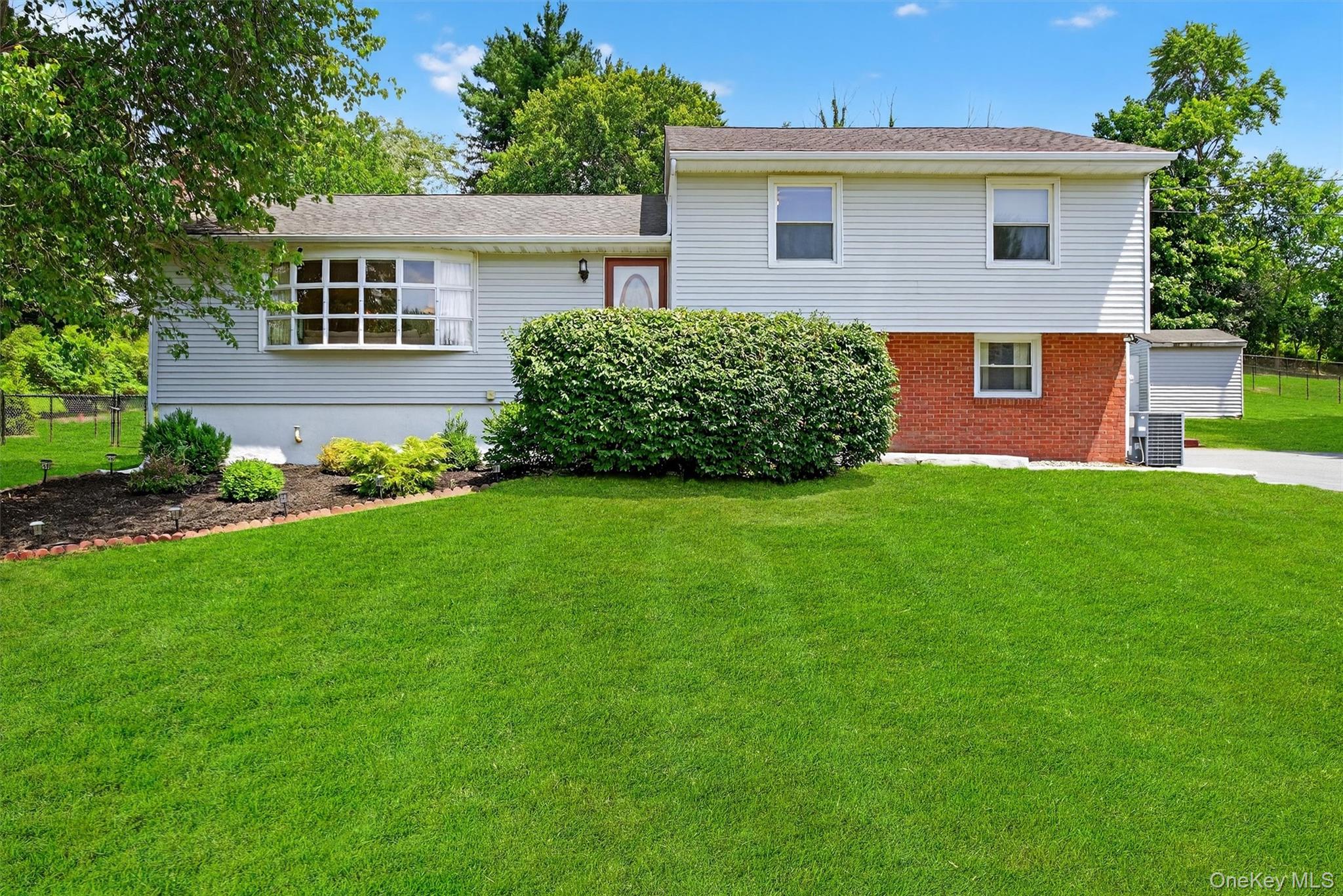 5 Verplanck Avenue Hopewell Junction, NY 12533 - Photo 1 of 50 a view of a house with a garden