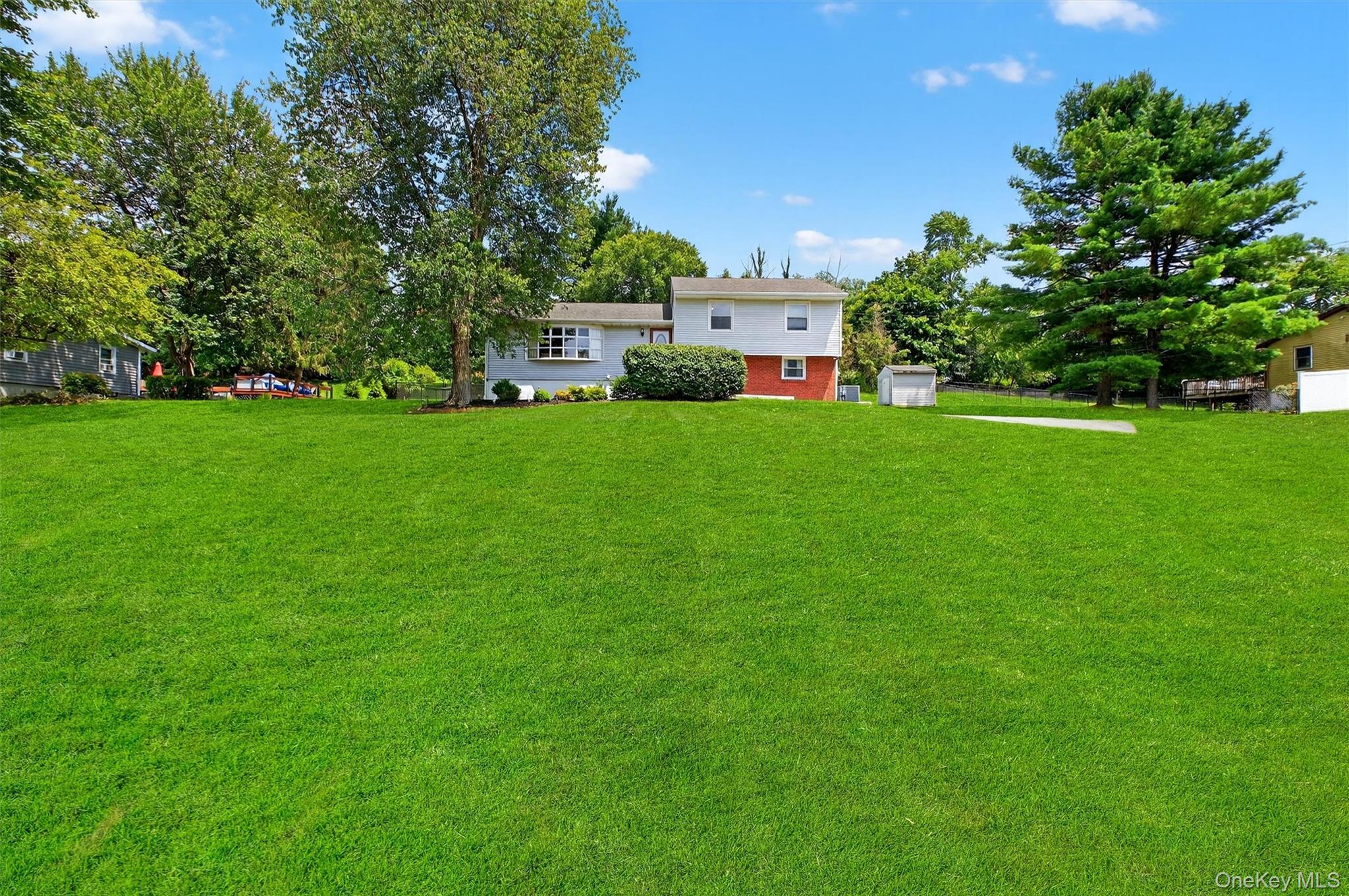 5 Verplanck Avenue Hopewell Junction, NY 12533 - Photo 2 of 50 a view of a house with a backyard