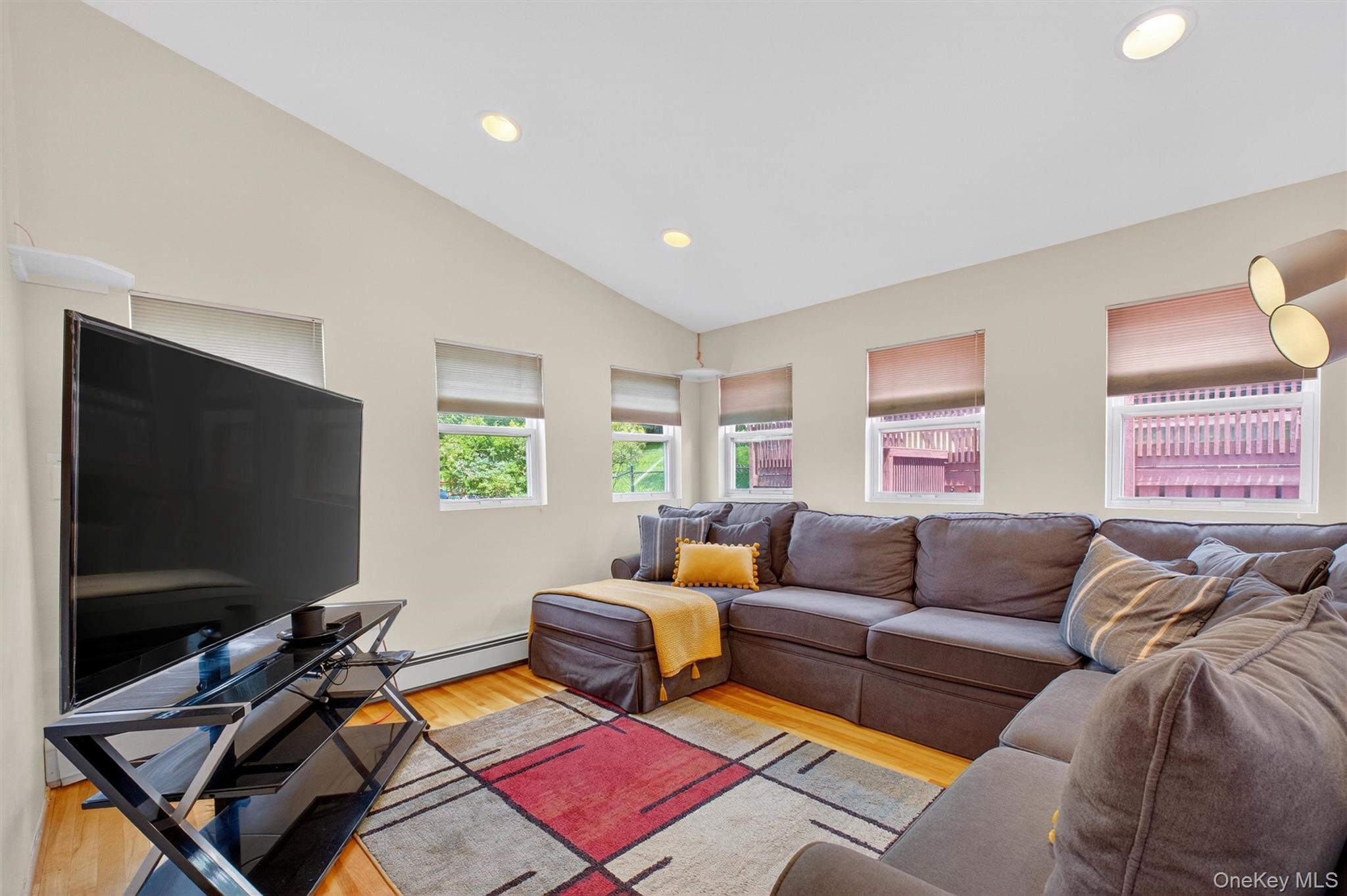 5 Verplanck Avenue Hopewell Junction, NY 12533 - Photo 21 of 50 a living room with furniture and a flat screen tv