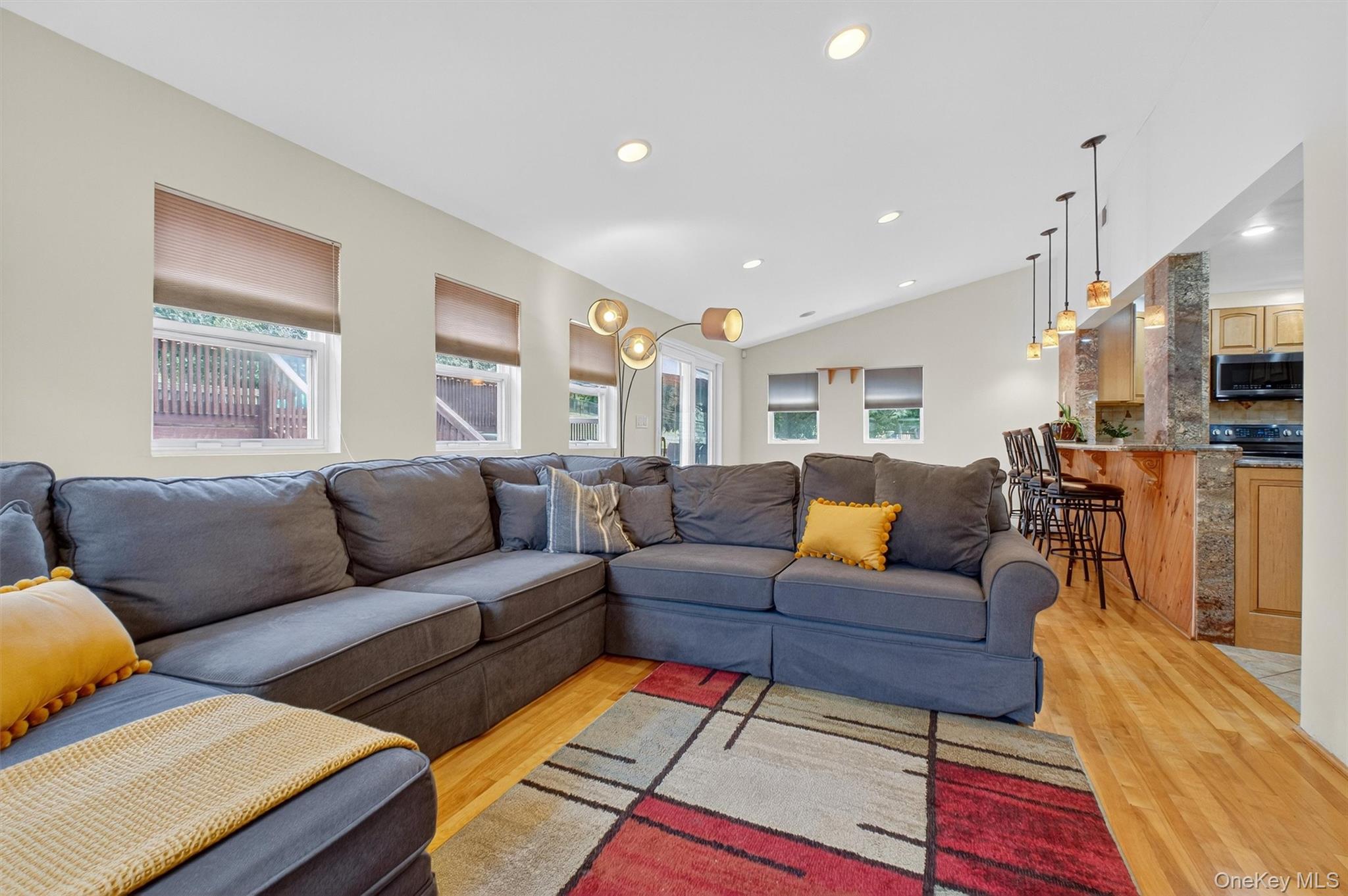 5 Verplanck Avenue Hopewell Junction, NY 12533 - Photo 22 of 50 a living room with furniture ceiling fan and a rug