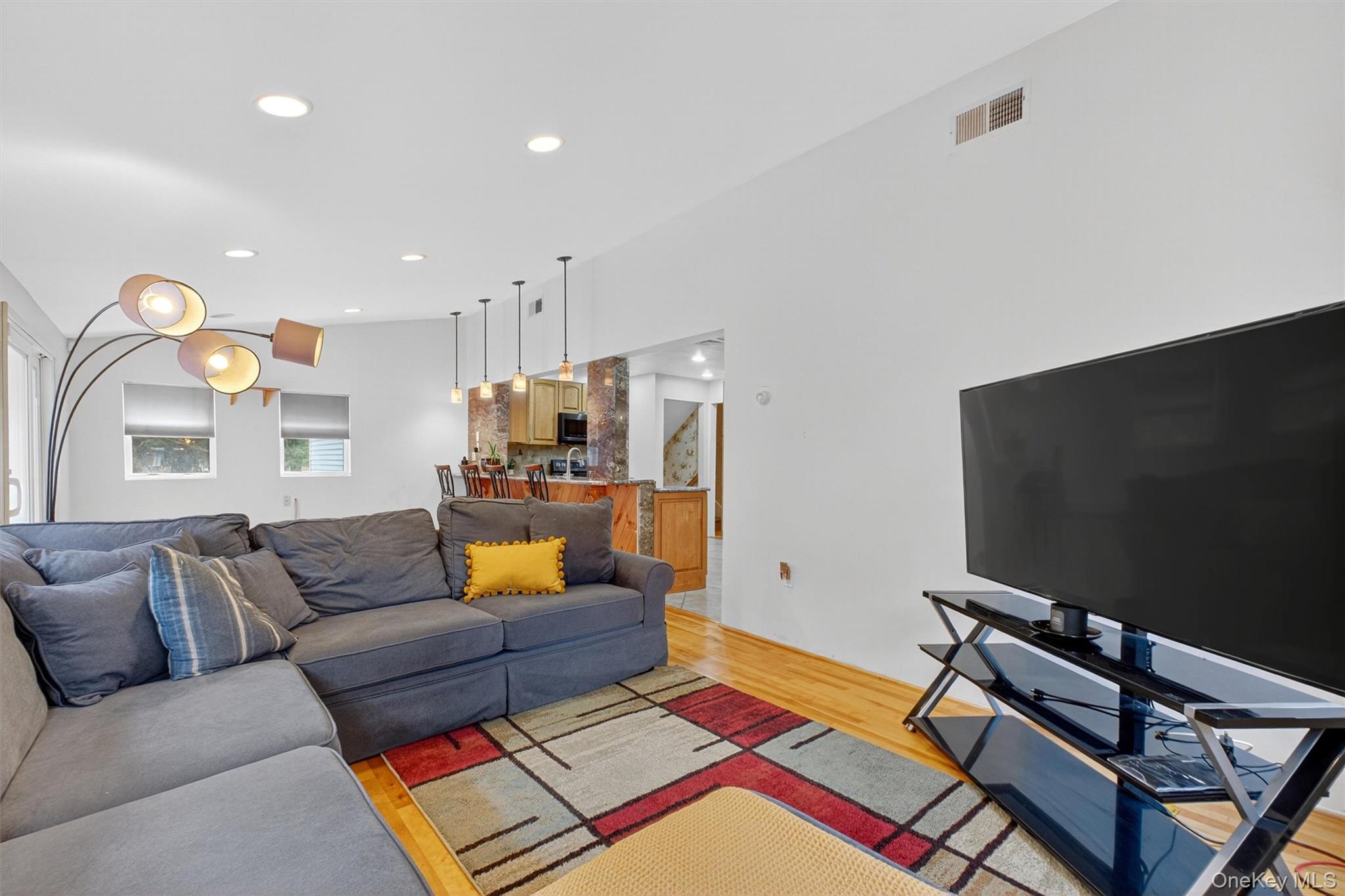 5 Verplanck Avenue Hopewell Junction, NY 12533 - Photo 23 of 50 a living room with furniture and a flat screen tv