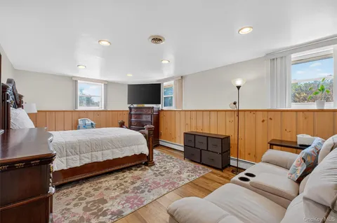 a bedroom with a bed and furniture