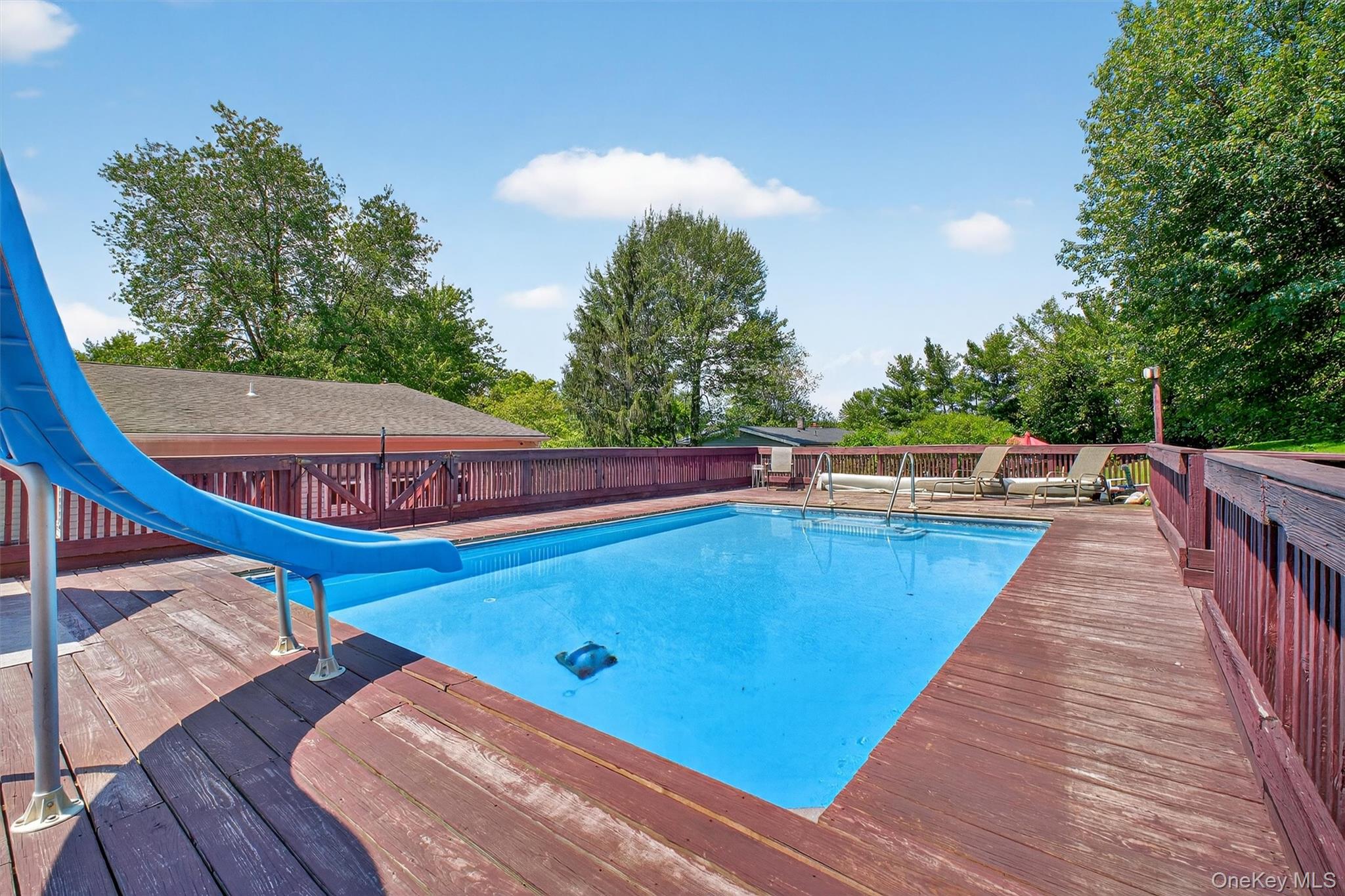 5 Verplanck Avenue Hopewell Junction, NY 12533 - Photo 39 of 50 a view of a swimming pool with a chairs