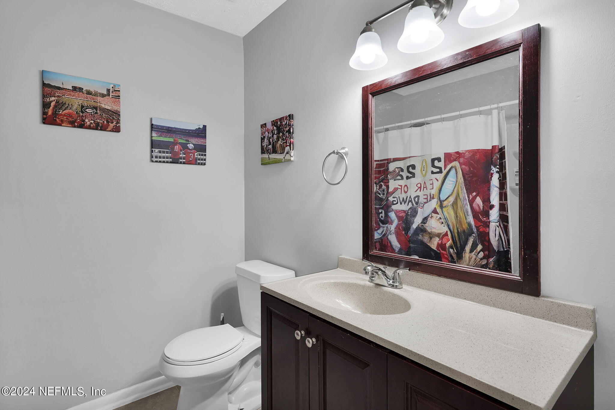 54371 Hazel Jones Road Callahan, FL 32011 - Photo 20 of 36 a bathroom with a sink and a mirror
