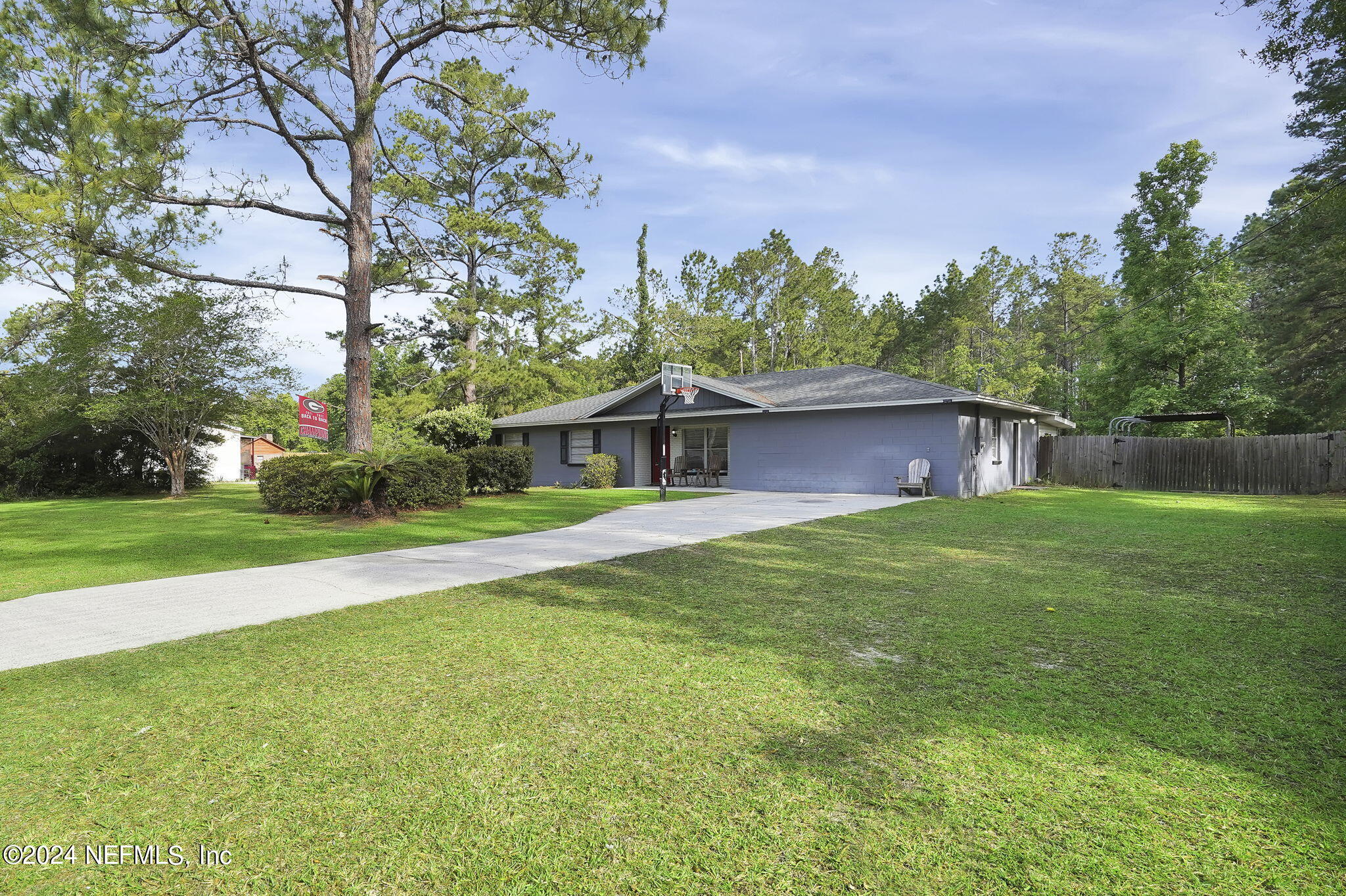 54371 Hazel Jones Road Callahan, FL 32011 - Photo 2 of 36 a front view of house with yard and green space