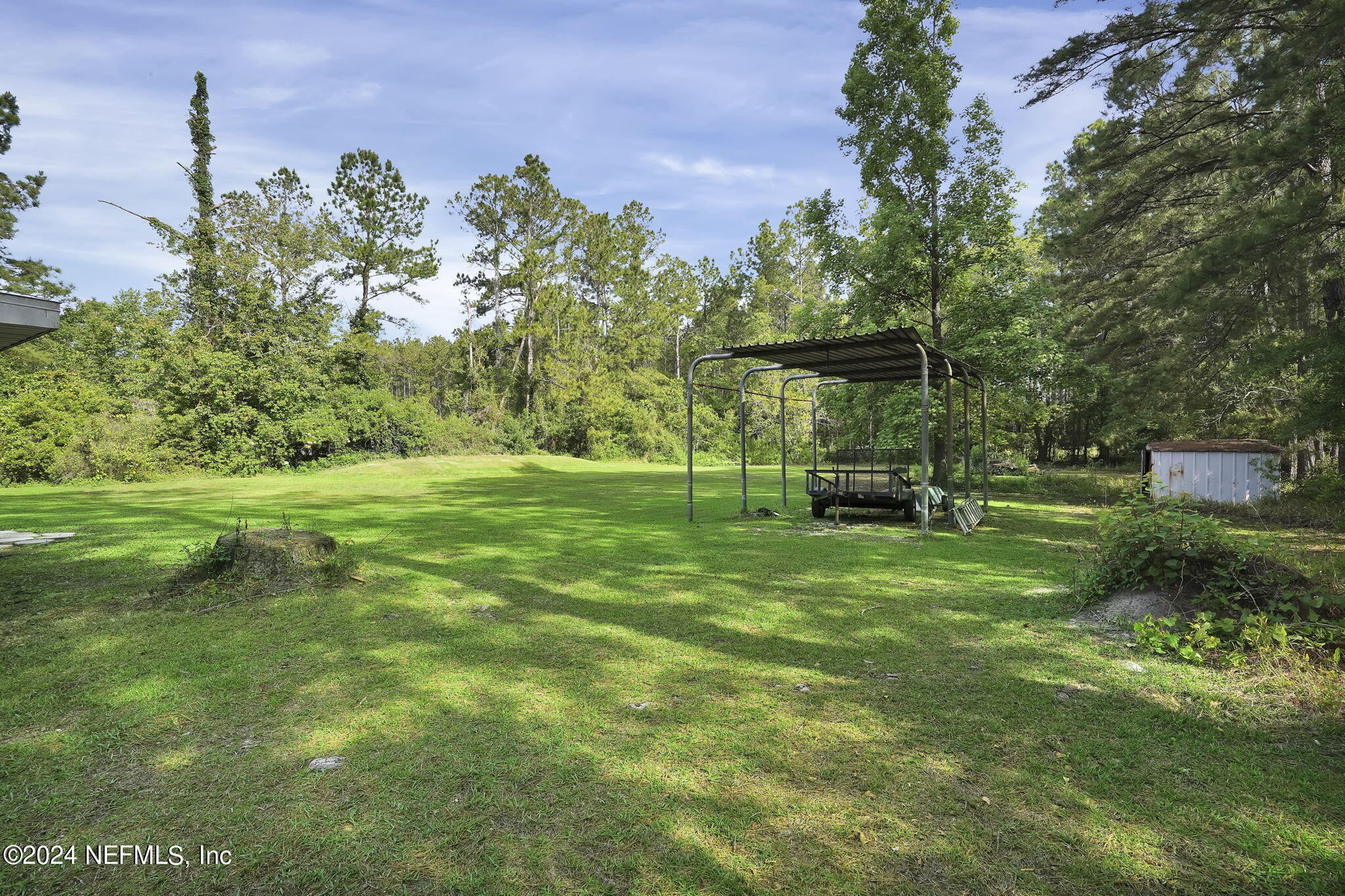 54371 Hazel Jones Road Callahan, FL 32011 - Photo 34 of 36 a view of a park with large trees