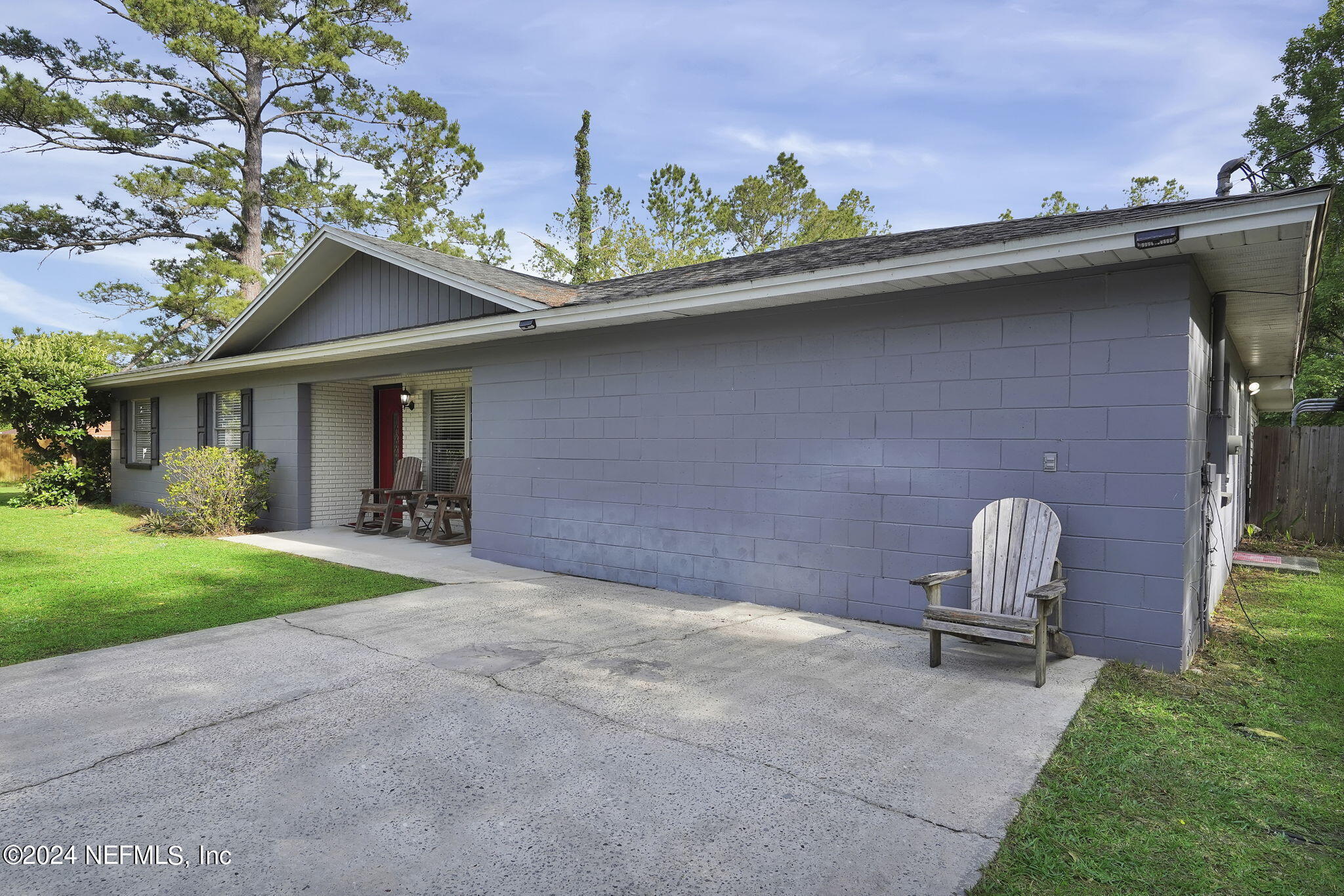 54371 Hazel Jones Road Callahan, FL 32011 - Photo 5 of 36 a front view of a house with garden