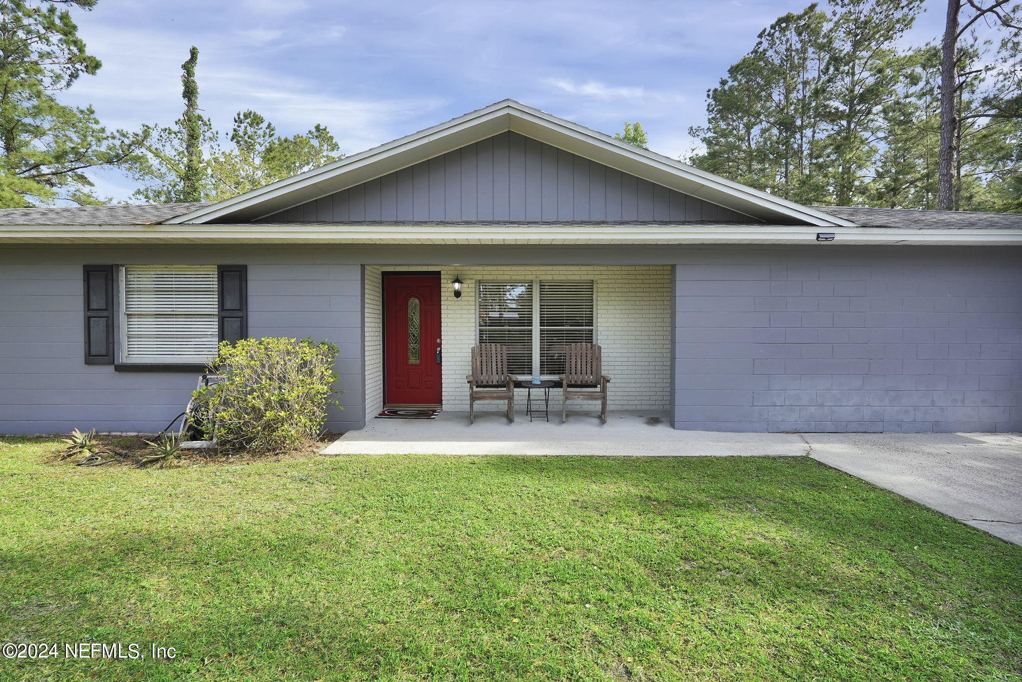 54371 Hazel Jones Road Callahan, FL 32011 - Photo 6 of 36 a view of a house with patio