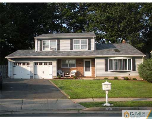 36 Brookside Road Edison, NJ 08817 - Photo 1 of 19 a front view of a house with a yard