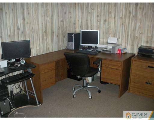 36 Brookside Road Edison, NJ 08817 - Photo 19 of 19 a view of workspace with wooden floor chairs