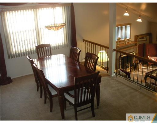 36 Brookside Road Edison, NJ 08817 - Photo 3 of 19 a view of a dining room with furniture window and outside view