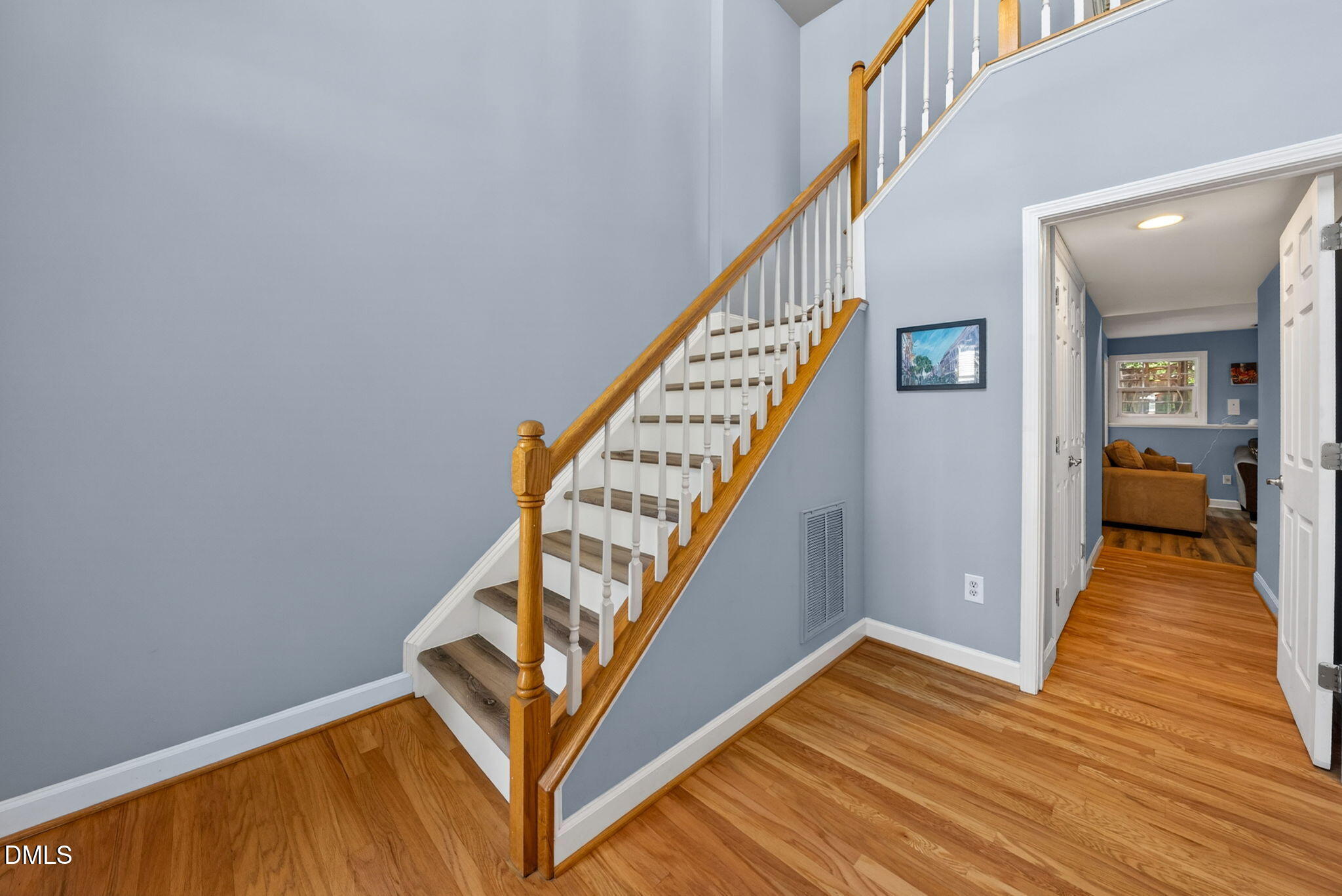 5500 Vista View Court Raleigh, NC 27612 - Photo 21 of 38 a view of an entryway with wooden floor