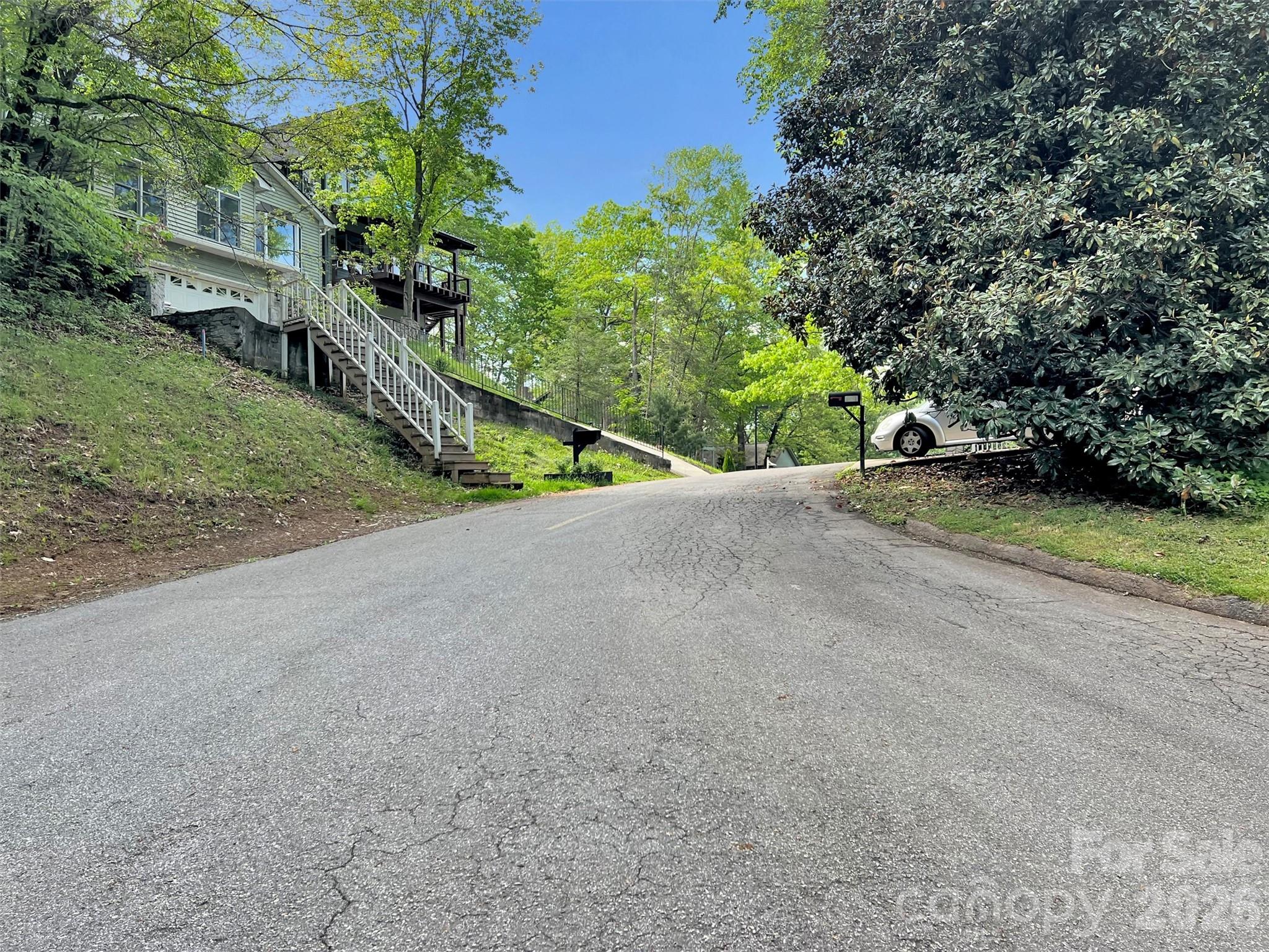 186 Aldersgate Road Waynesville, NC 28786 - Photo 12 of 14 a view of a park with plants and trees