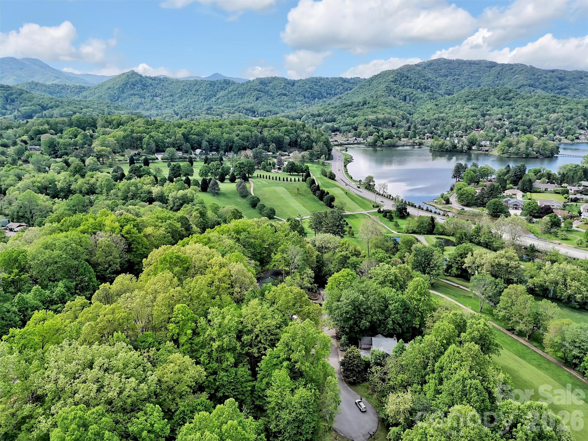186 Aldersgate Road Waynesville, NC 28786 - Photo 6 of 14 an aerial view of a house with a yard