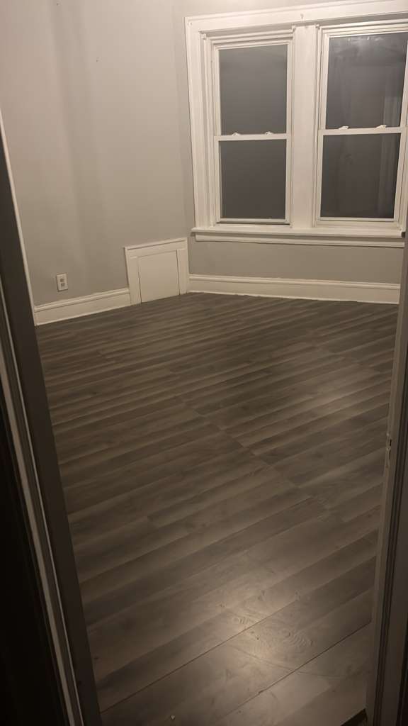 7842 South Bennett Avenue, Unit 2 Chicago, IL 60649 - Photo 8 of 10 a view of wooden floor