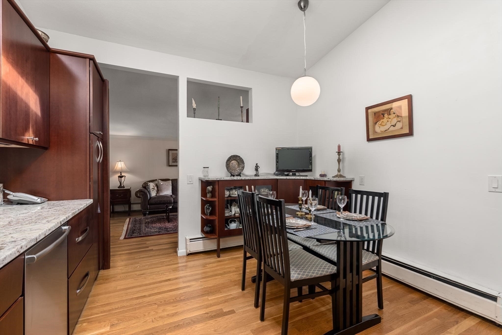 54 Clark Street Newton, MA 02459 - Photo 16 of 34 a view of a dining room with furniture